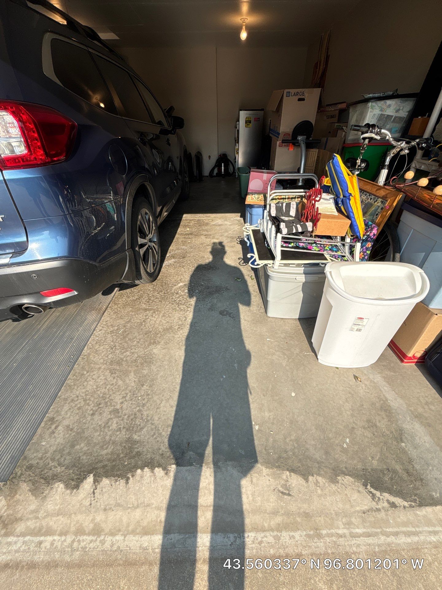 Custom Polyurea Flake Garage Floor Installation in Sioux Falls by Select Painting, Coatings & Garage Cabinets