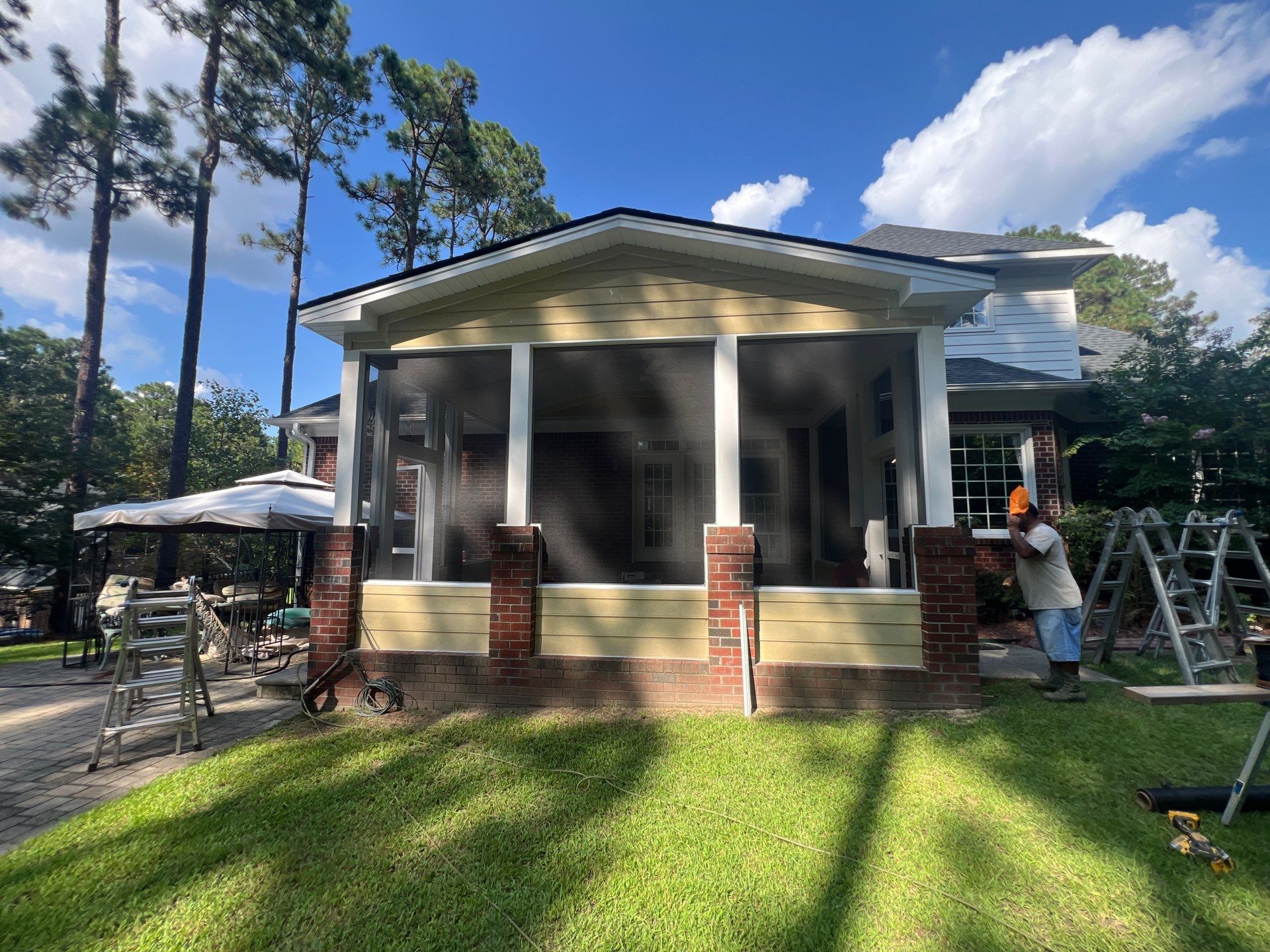 Custom Screened-In Porch Addition with Open Gable Roof in Fayetteville by The Remodeling Company