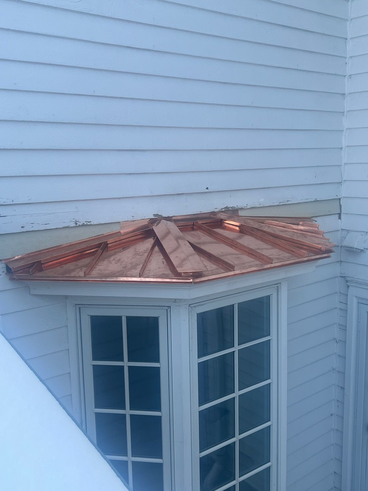 Copper Roof using Copper by Absolute Roofing and Construction