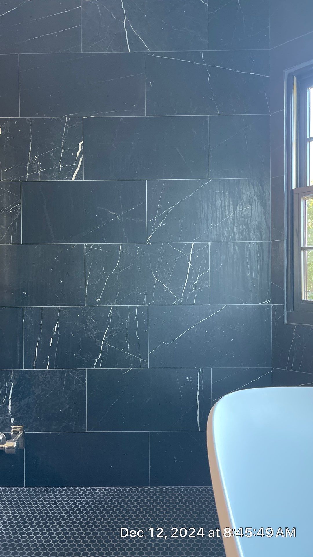 Marble shower restoration by The Beautiful Stone Company
