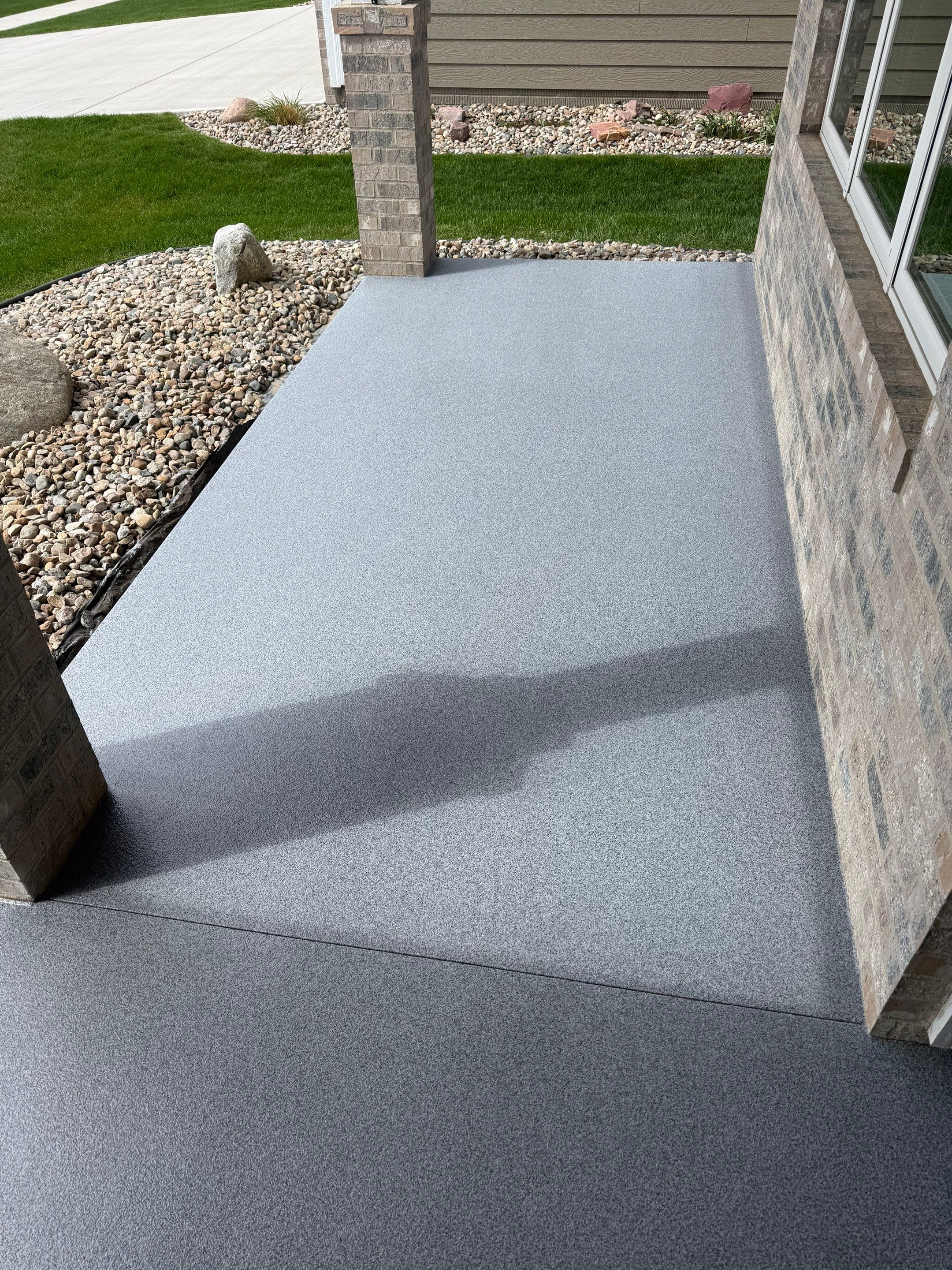 Decorative Flake Concrete Coating for Sioux Falls Porch and Patio by Select Painting, Coatings & Garage Cabinets