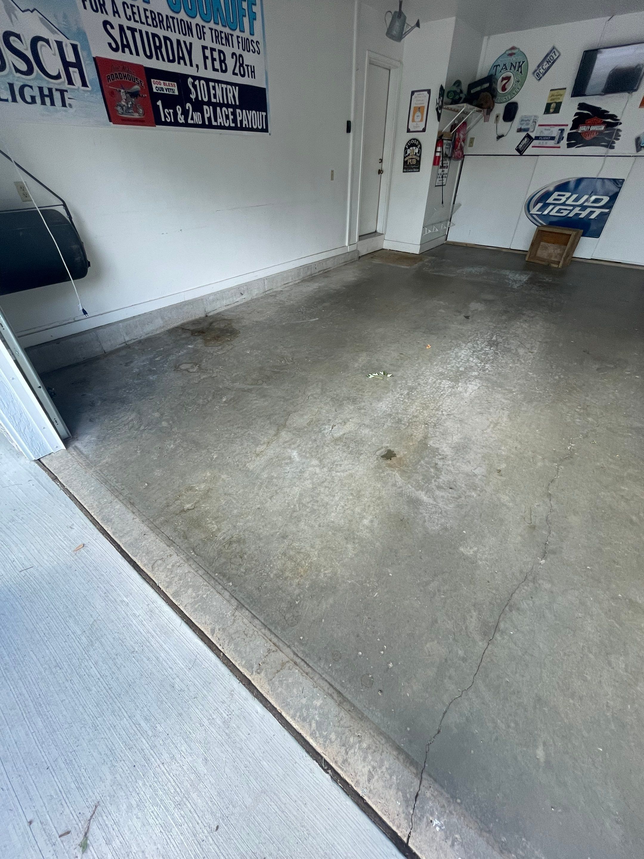 Residential Garage Floor Coating with Feather Grey Finish in Sioux Falls by Select Painting, Coatings & Garage Cabinets