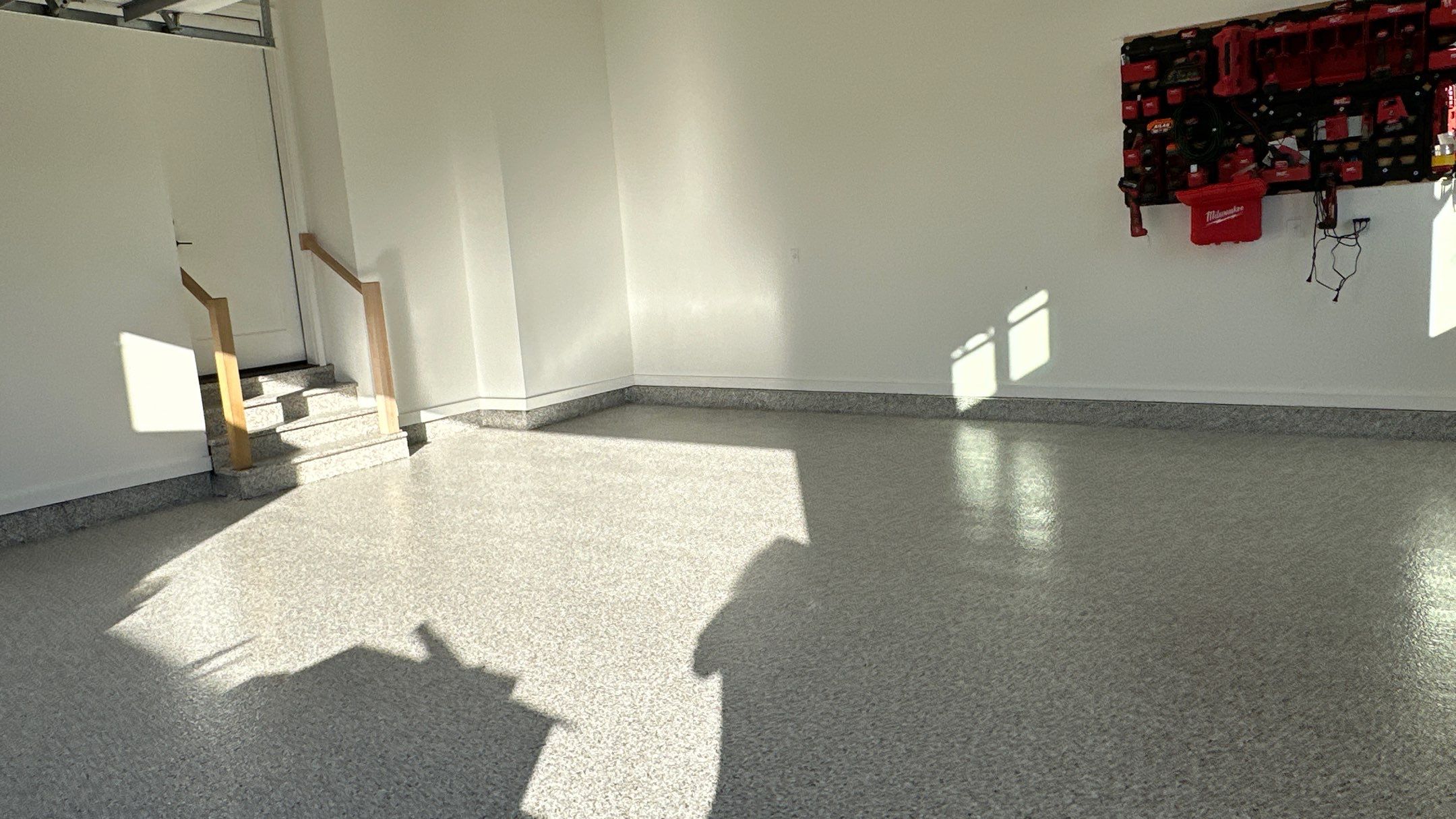 Mike M. got him self a beautiful Coyote flake floor by Banner Garage