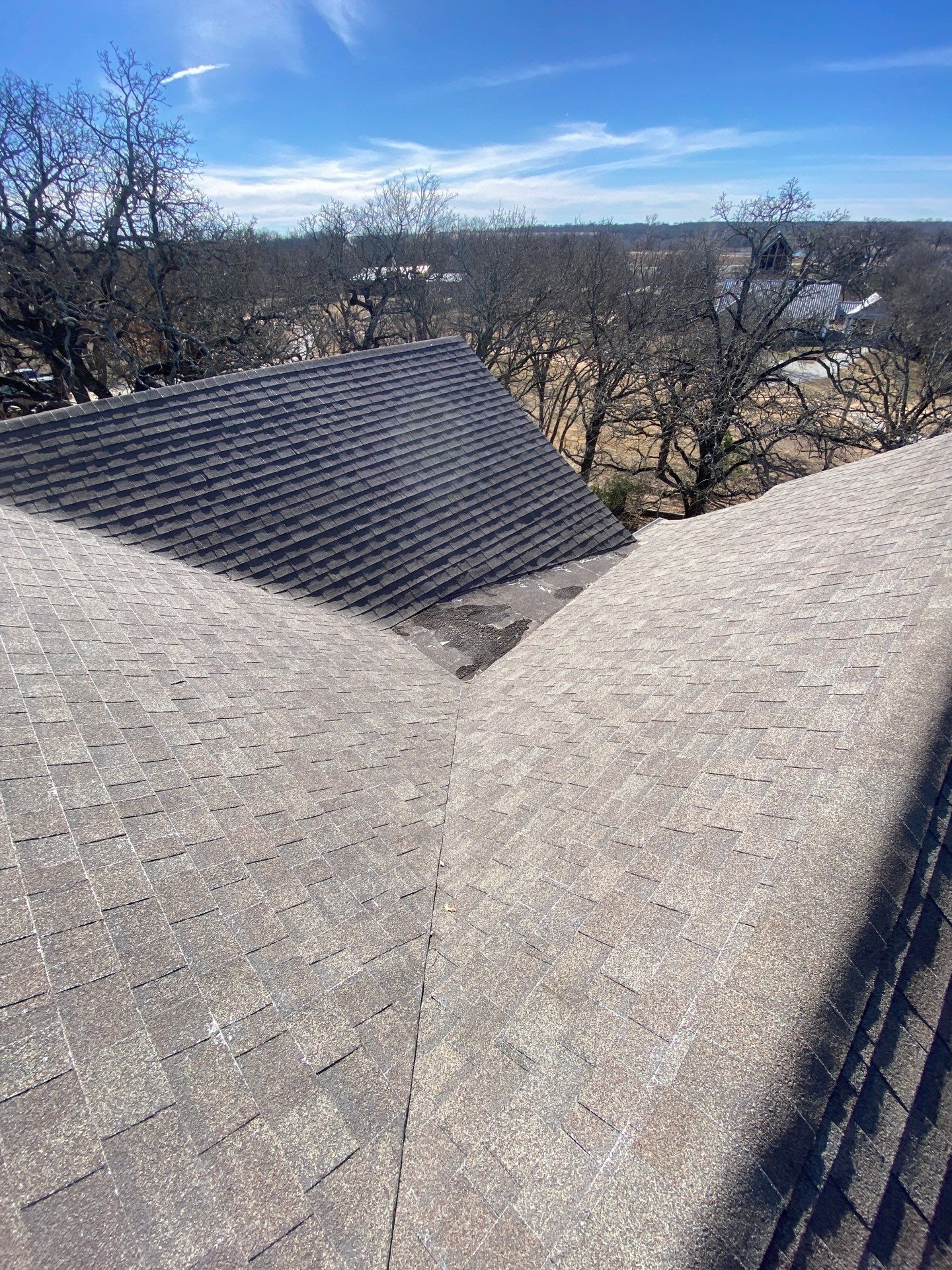 Roof Replacement on a private lake near Ardmore by BANA Roofing and Solar Supply