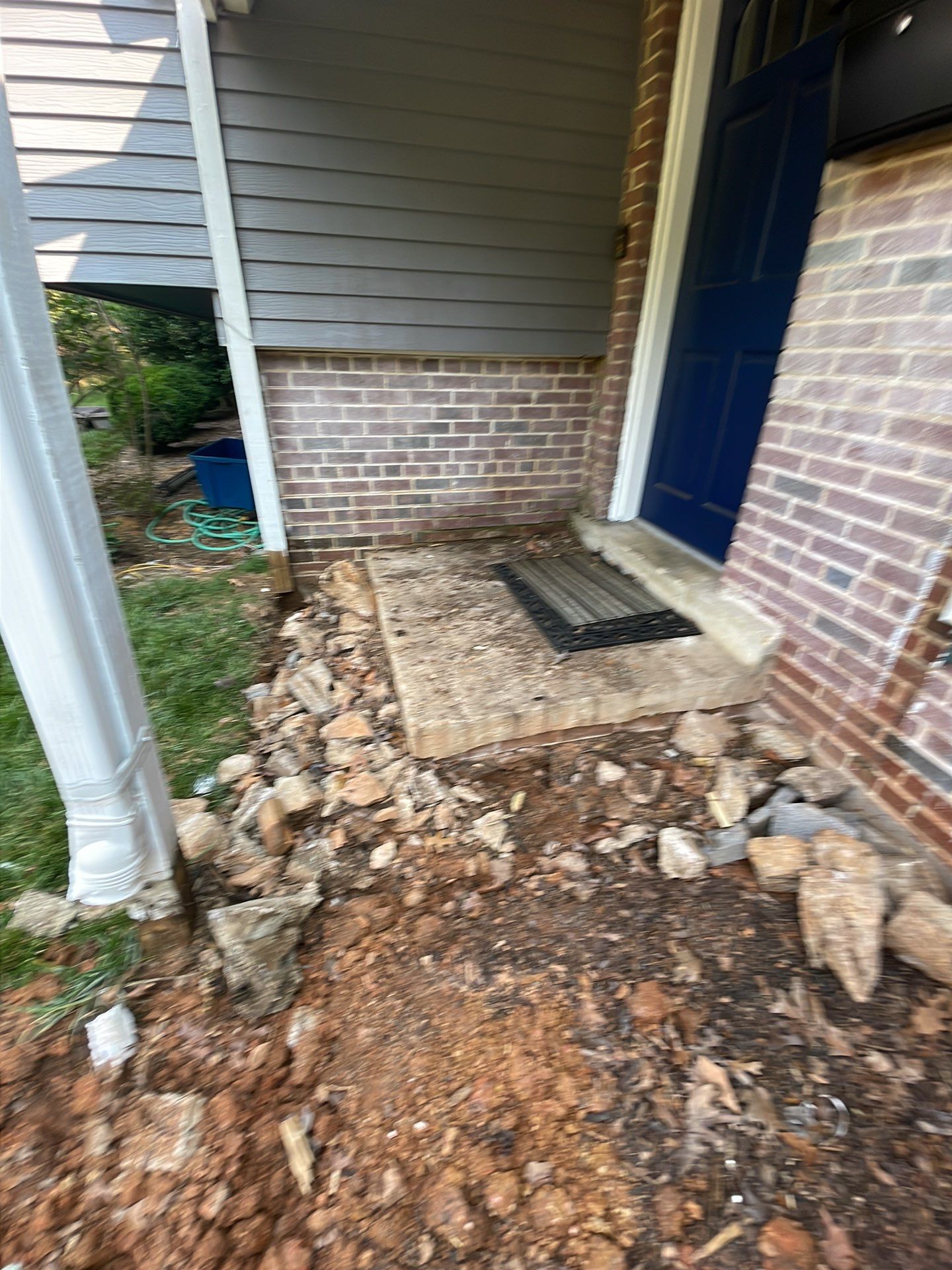 New walkway with stairs and a new front porch by Fairfax Contractors, LLC