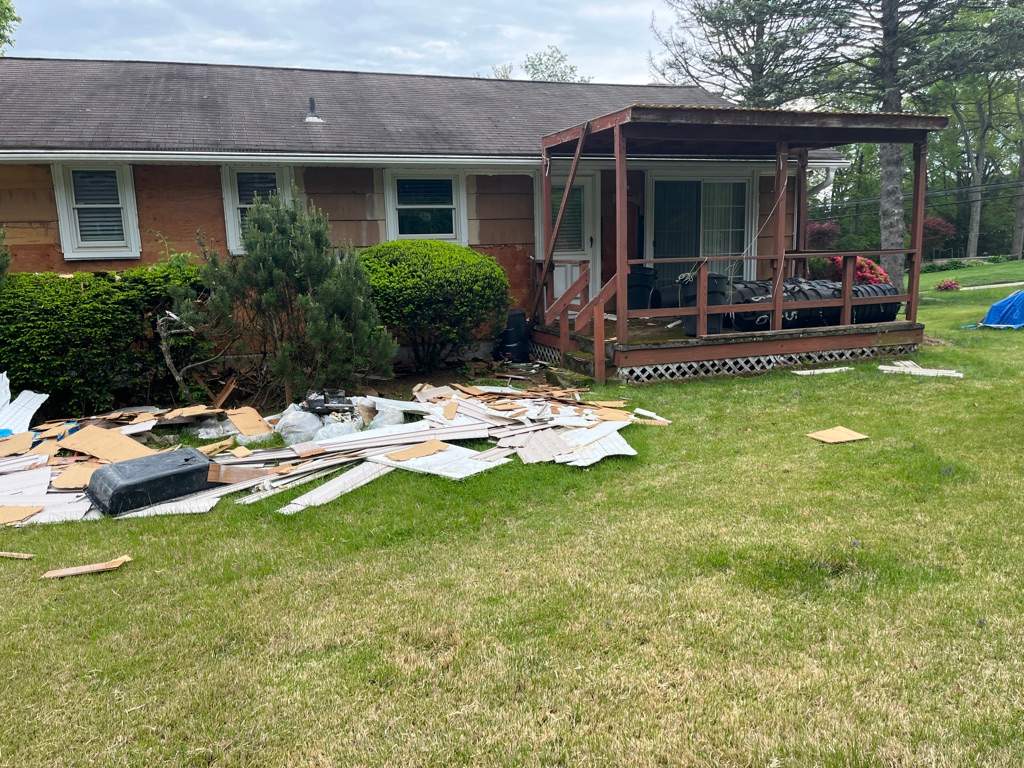 Deck Replacement using Trex Tropical Tiki Torch and White Transcend railings with lattice bottom by DiGiorgi Roofing and Siding Inc