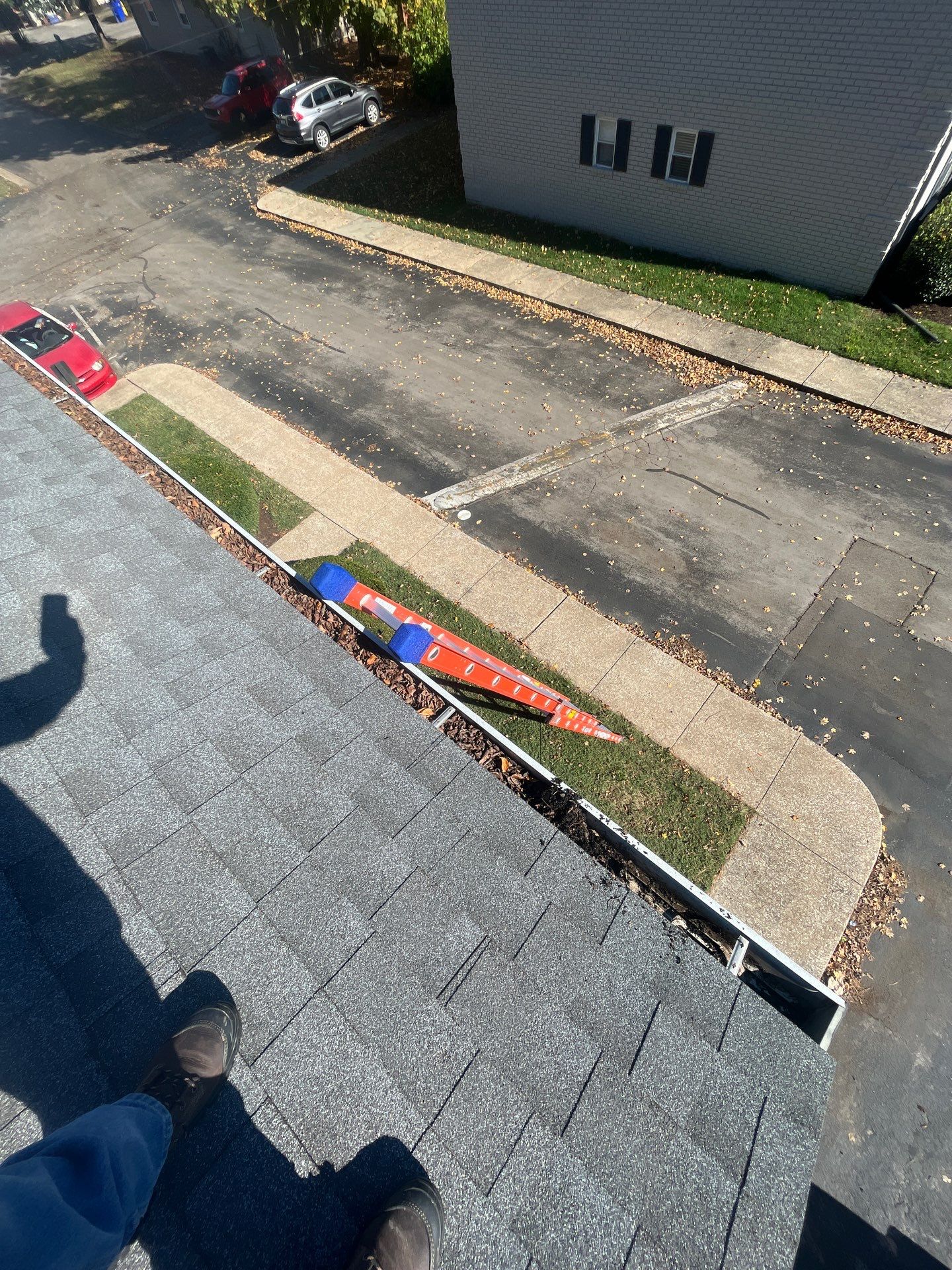 Commercial gutter cleaning Bowling Green, KY before photo with filled gutters