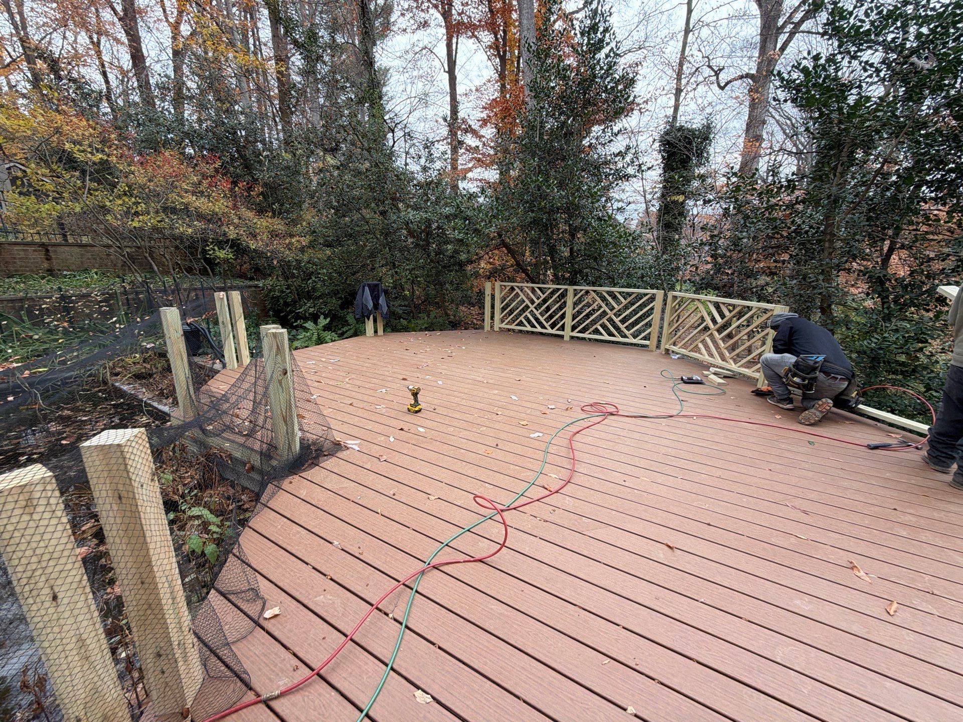 Custom Composite Deck Replacement with Geometric Railing in Bethesda, MD by Jakari Restoration & Construction LLC