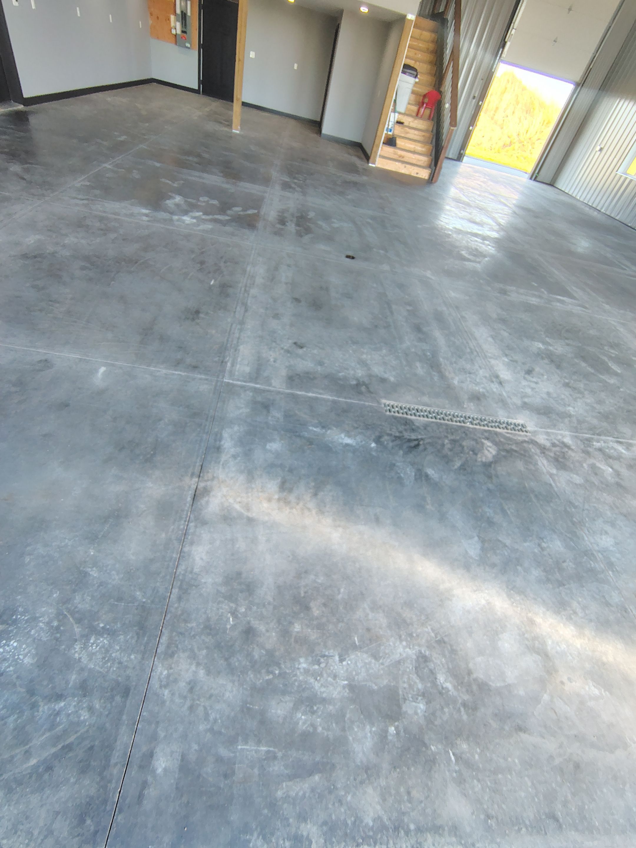 Polyaspartic Garage Floor Coating with Decorative Flake in Wentworth by Select Painting, Coatings & Garage Cabinets