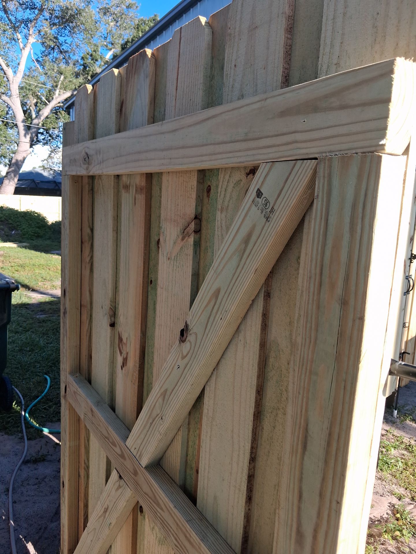 Pressure-Treated Wood Privacy Fence and Gate Installation in North Port by True Fence LLC