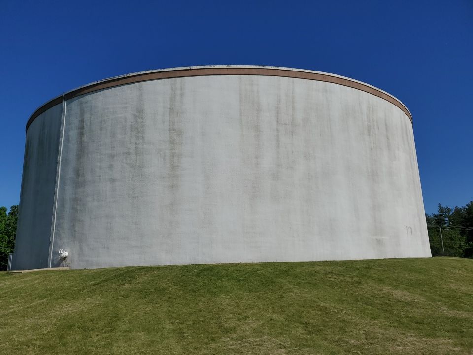 Water tank cleaning by Northern Power Washing LLC.