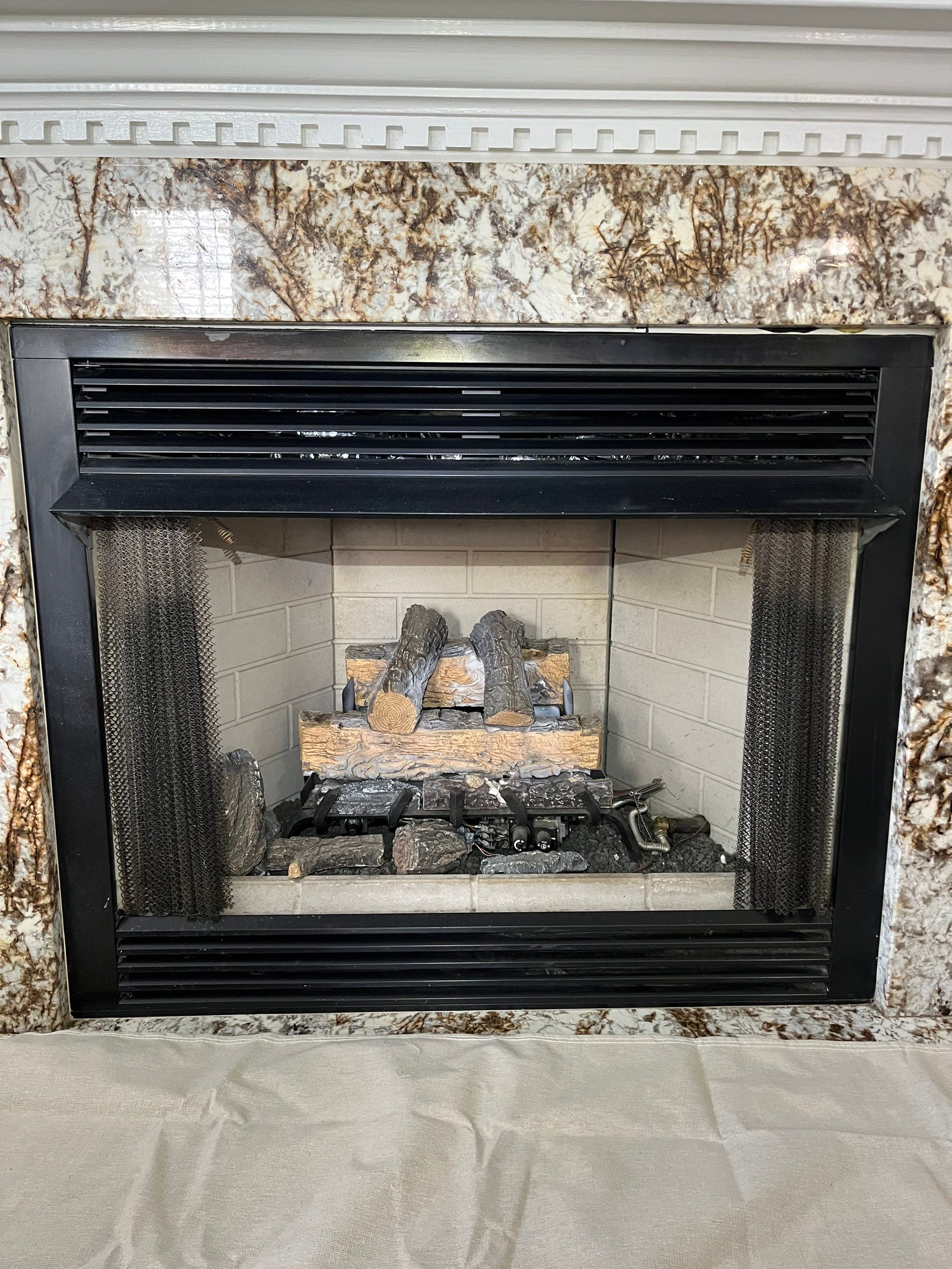 Gas Log Installation in Hampton by Premier Chimney and Roofing