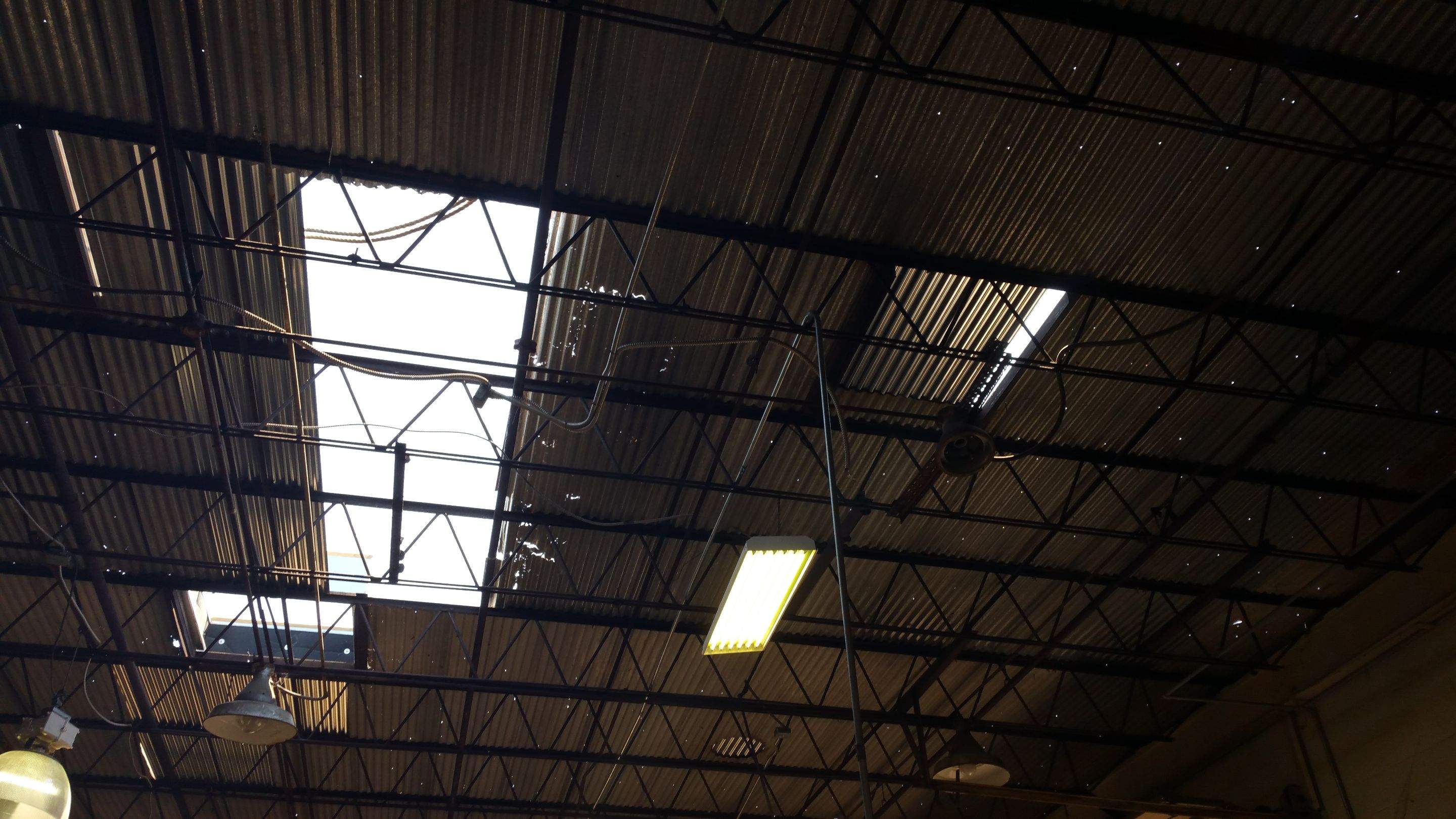 Massive Storm Damage Project - Factory in Arlington by First United Roofing & Construction