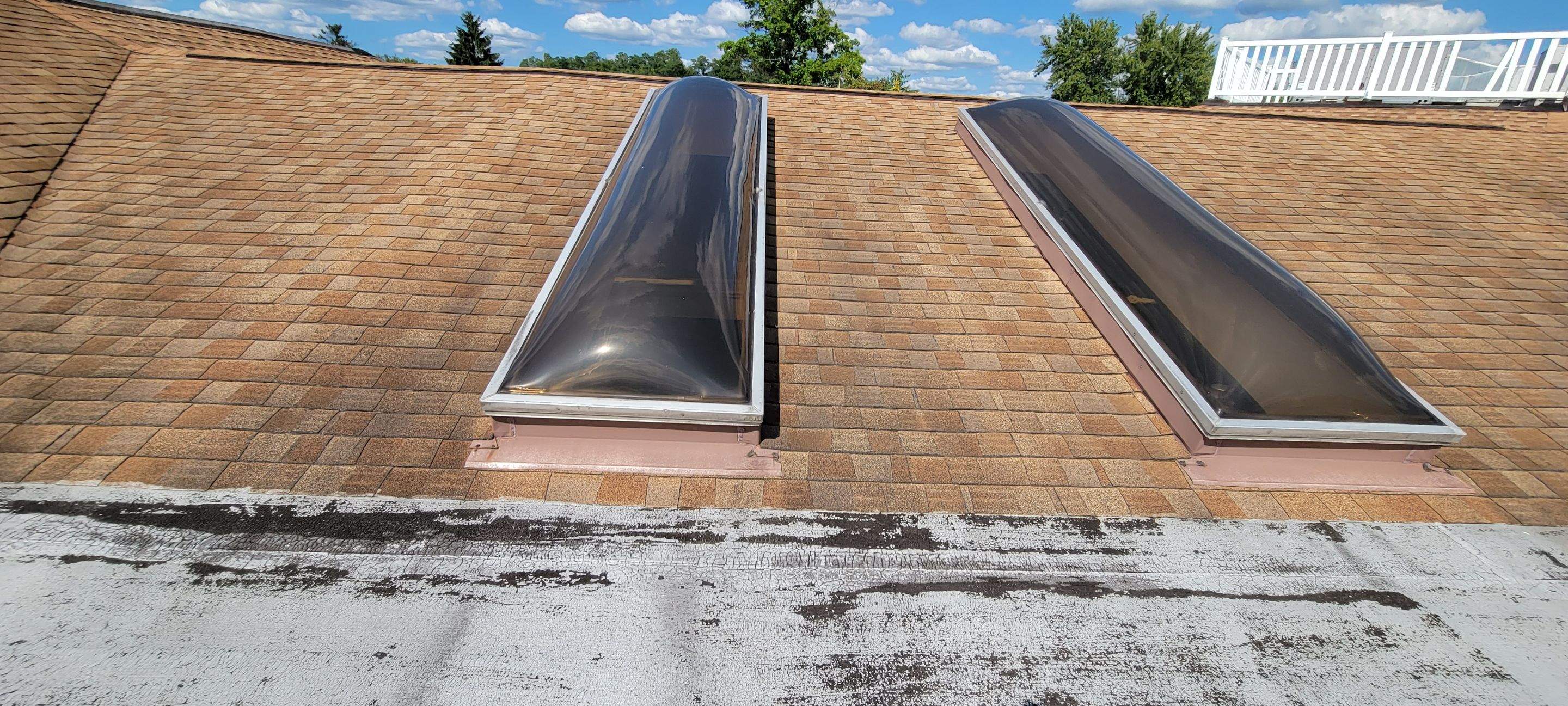 Skylight removal and install  by Absolute Roofing and Construction