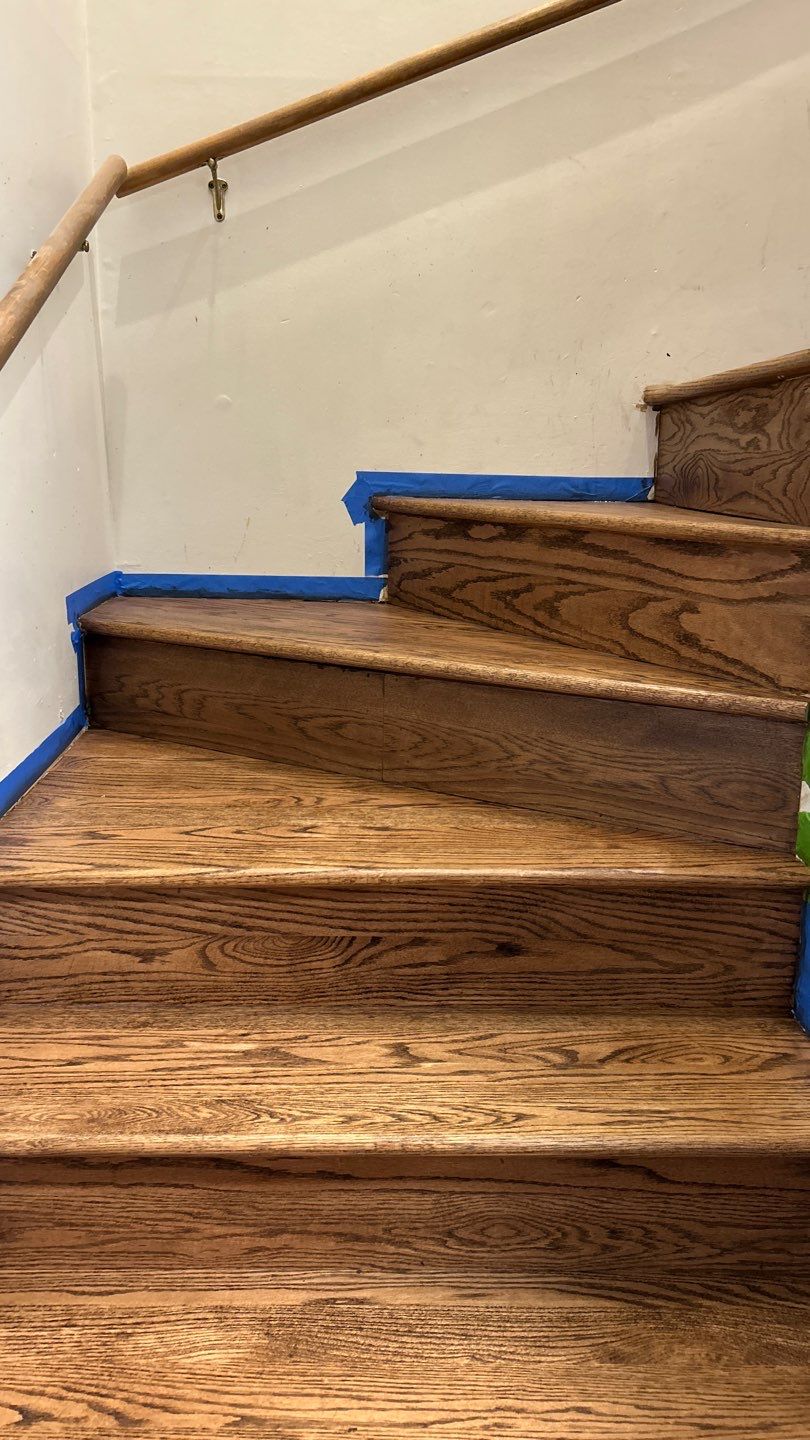 Parquet floor and stair treads by Footprints Floors of Nashville
