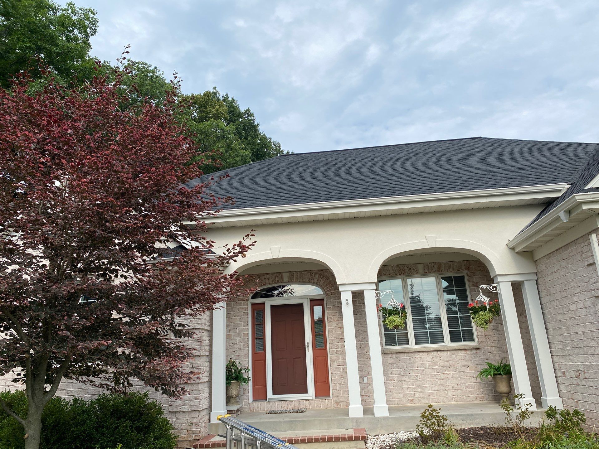 Classic Stucco Beauty  by Gellings Roofing & Siding