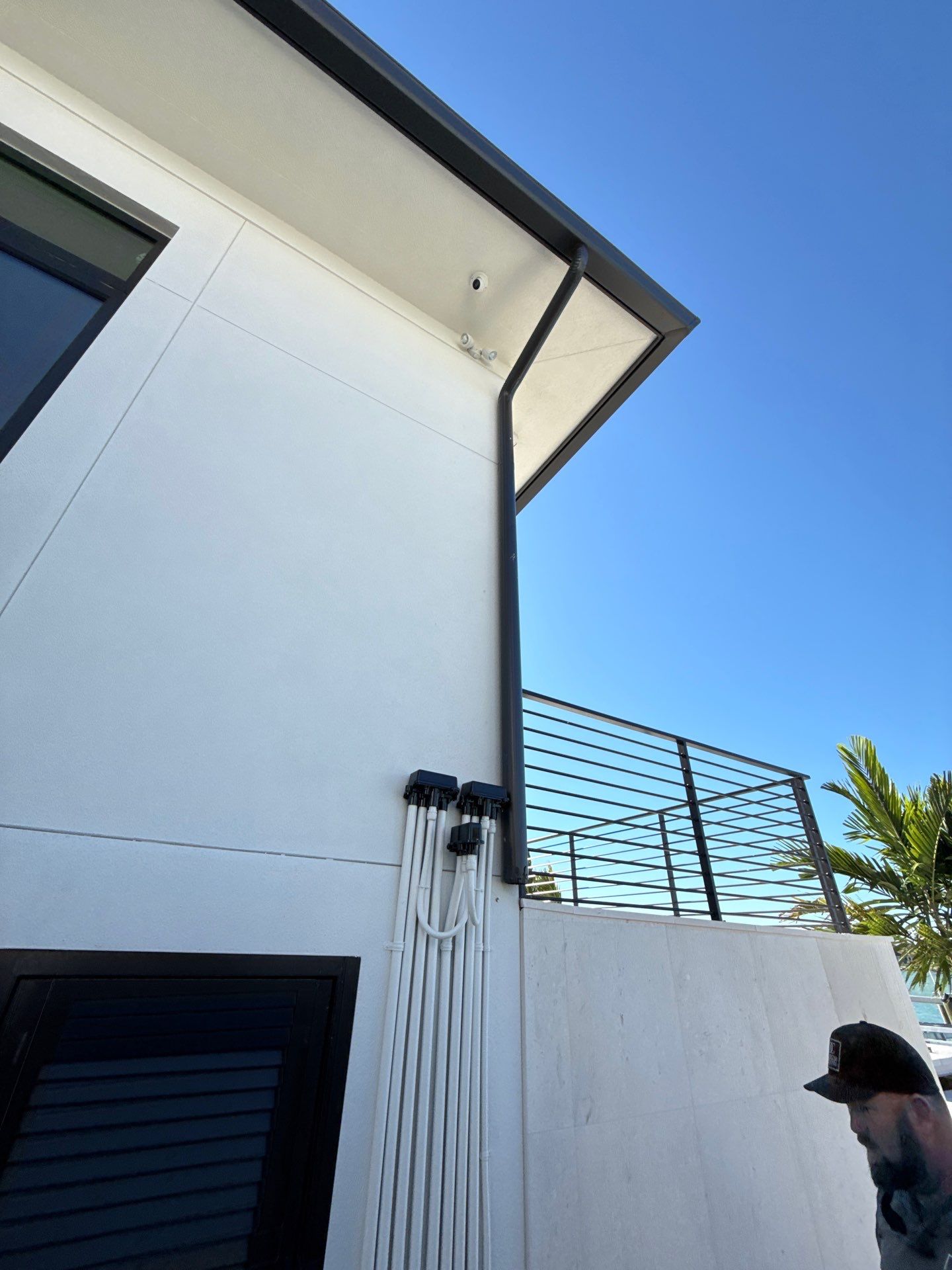 Seamless Aluminum Gutter Installation using black seamless gutters in Sarasota FL by Gutter Professors
