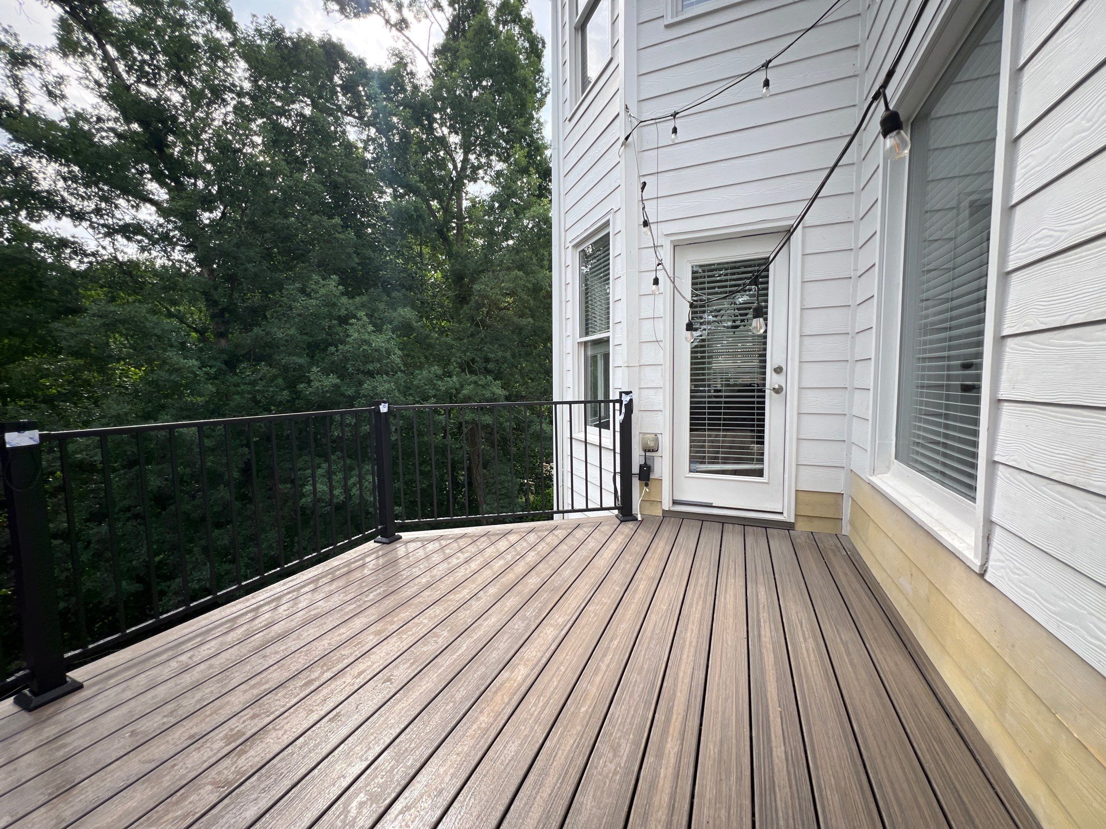 Elevated Composite Deck and Concrete Landing Installation in Kennesaw by Swift Home Renovations