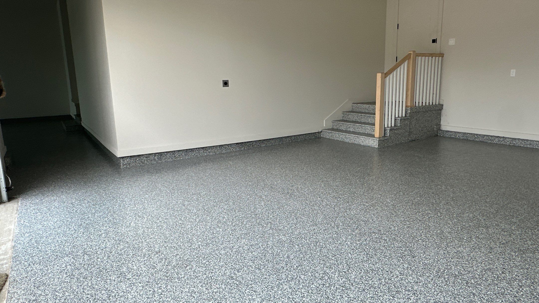 Check out how beautiful a brand new stonehenge flake floor looks by Banner Garage
