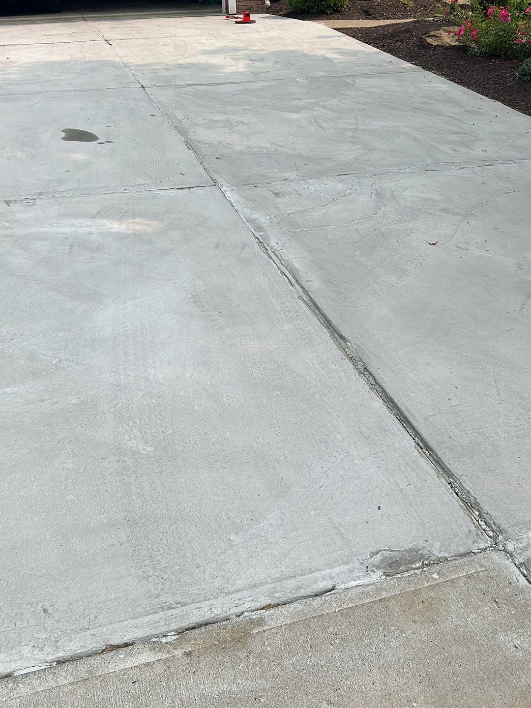 Pool Deck + Driveway + Garage Project in Venetia by Floors in a Day, Inc