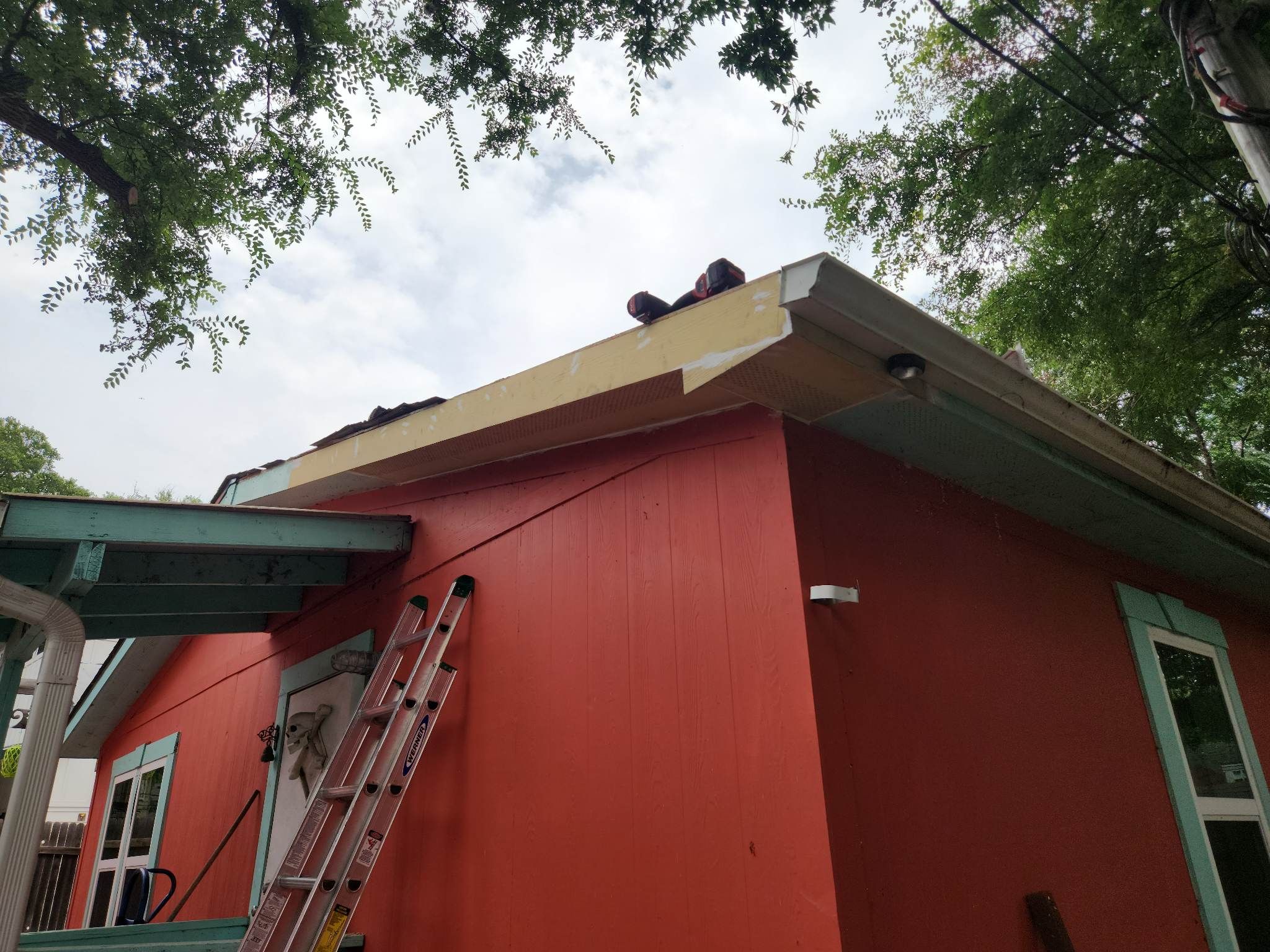 Tree Damage Roof Fascia and Soffit Repair by DeZign Roofing & Exteriors