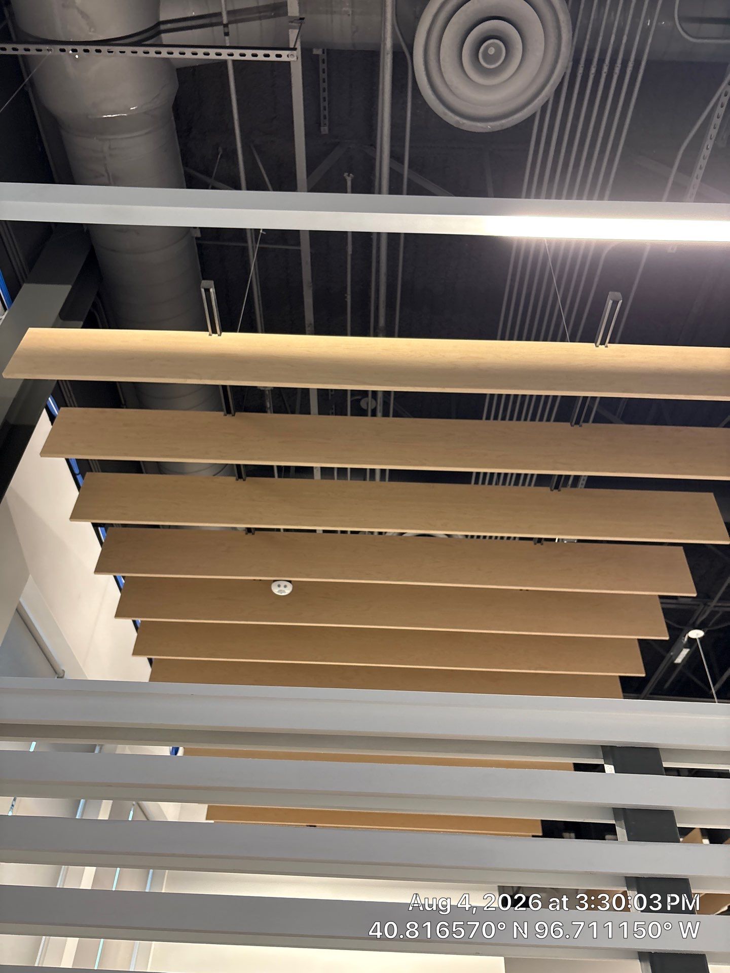 Commercial Office Interior Renovation with Acoustic Ceiling Baffles by CompanyCam Sales Demo