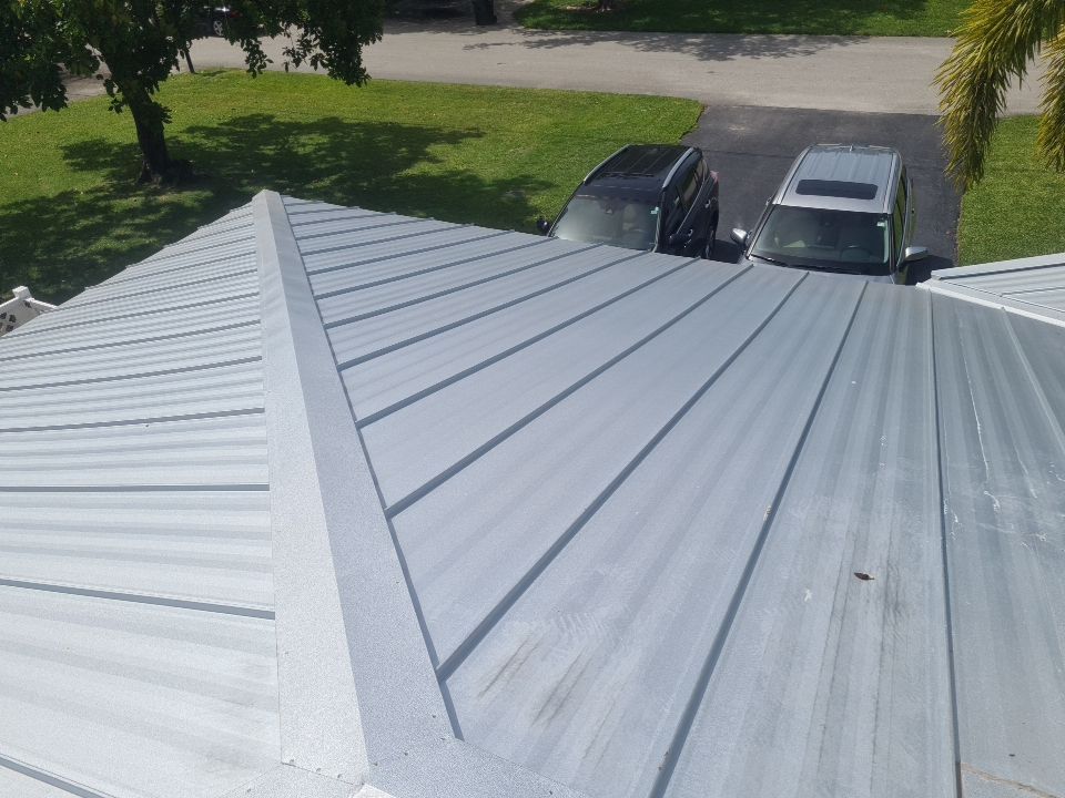 Residential Roofing Installation using 1" Nail strip metal roof by BLUES BROTHERS ROOFING