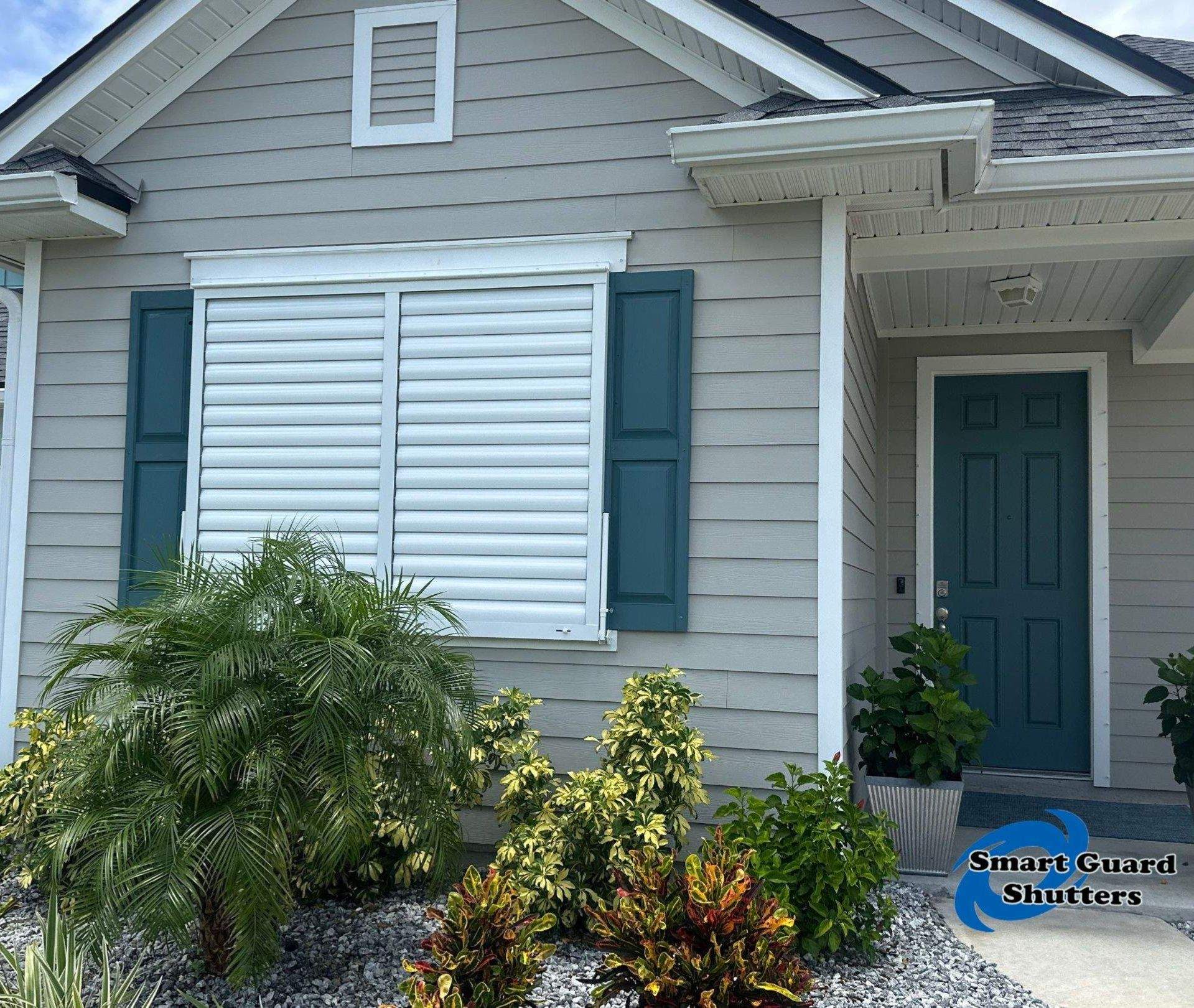 Impact Bahama Shutters in Signal White by Smart Guard Shutters