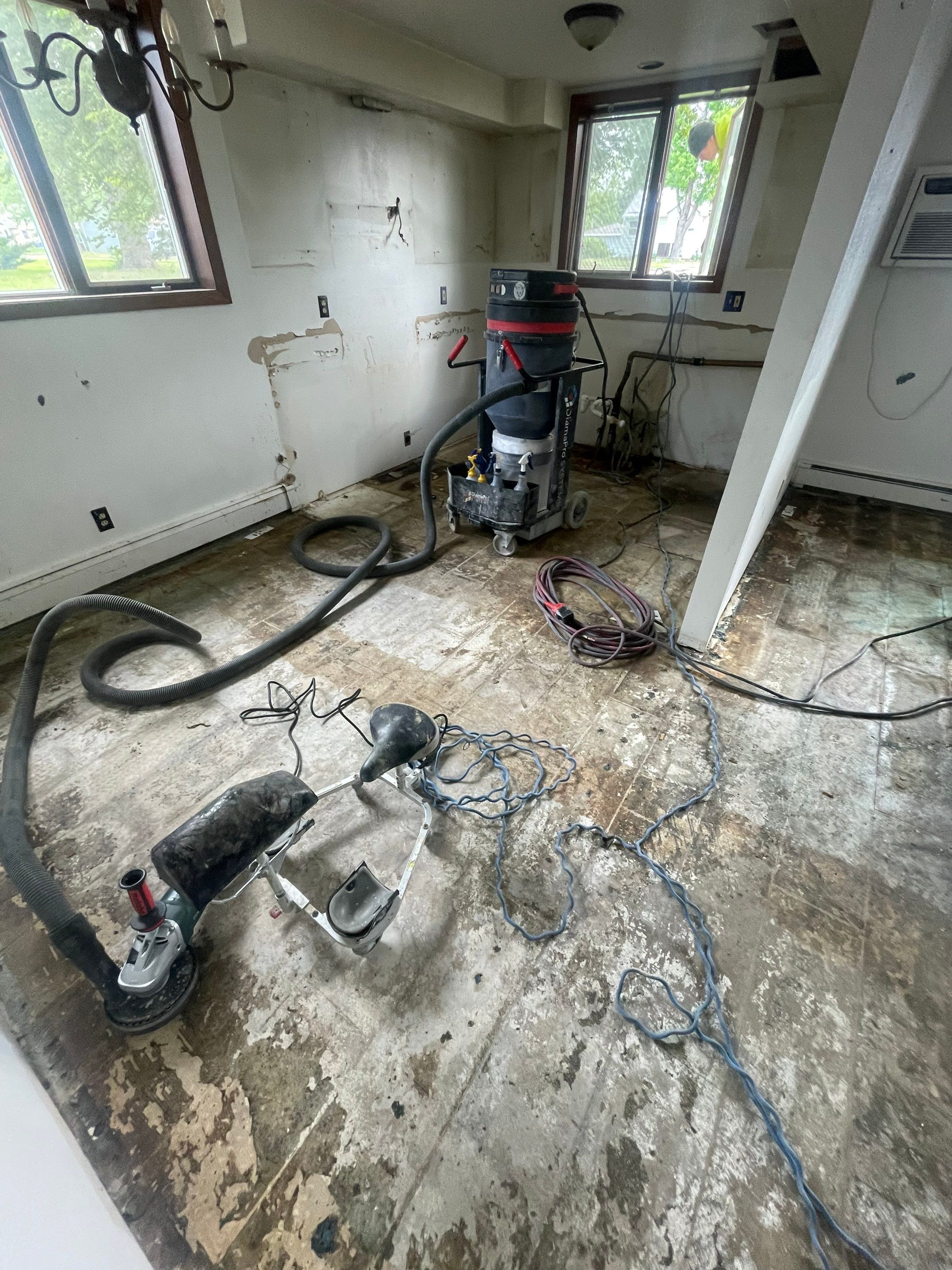 Commercial Subfloor Preparation and Flooring Restoration in Sioux Falls by Select Painting, Coatings & Garage Cabinets