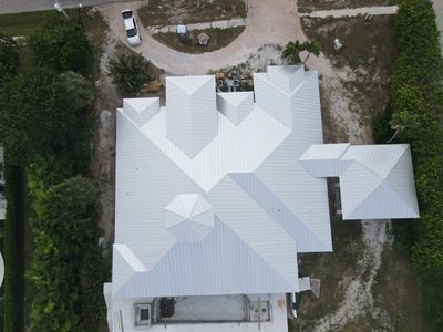 Residential Roofing Installation using Galvalume Standing Seam 