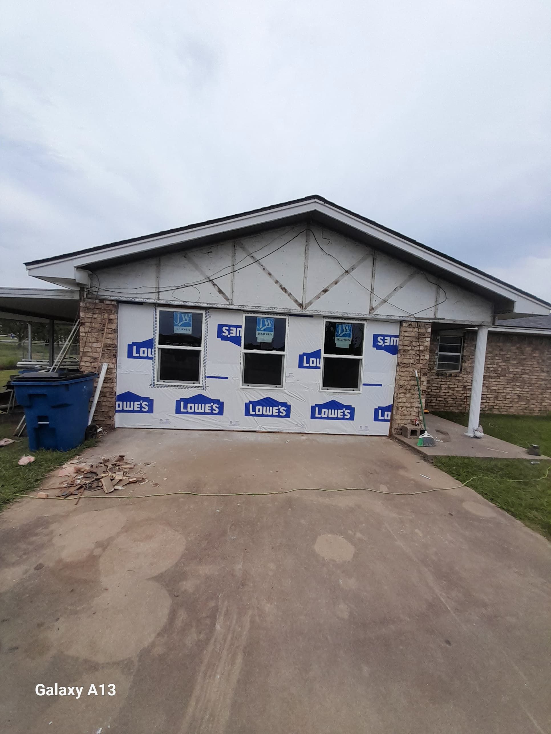 New roof & siding and interior repairs paid by insurance. Along with new roof sheathing.  by In & Out Construction & Remodeling, LLC