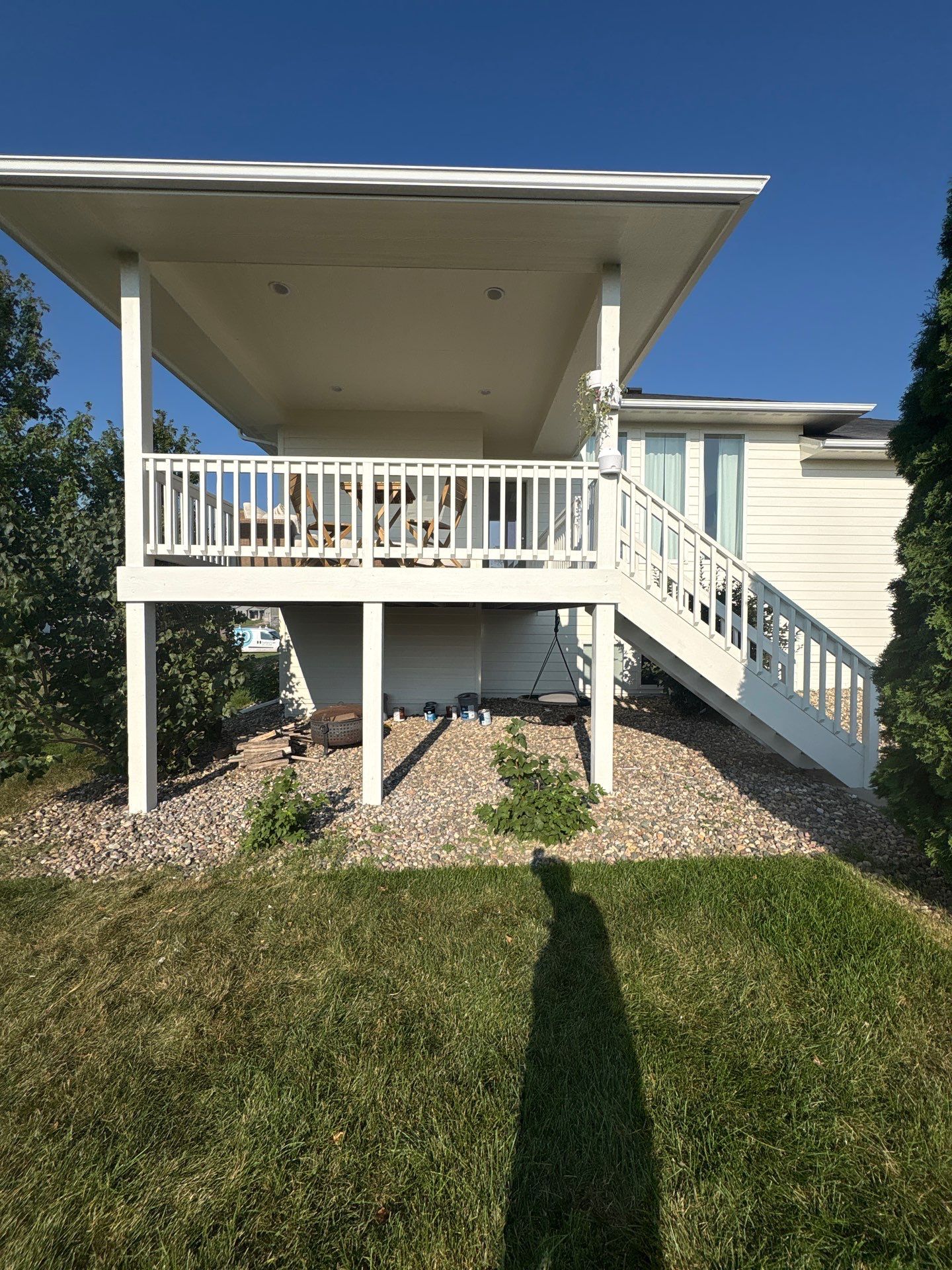 Sioux Falls Exterior Residential Siding and Deck Painting Project by Select Painting, Coatings & Garage Cabinets
