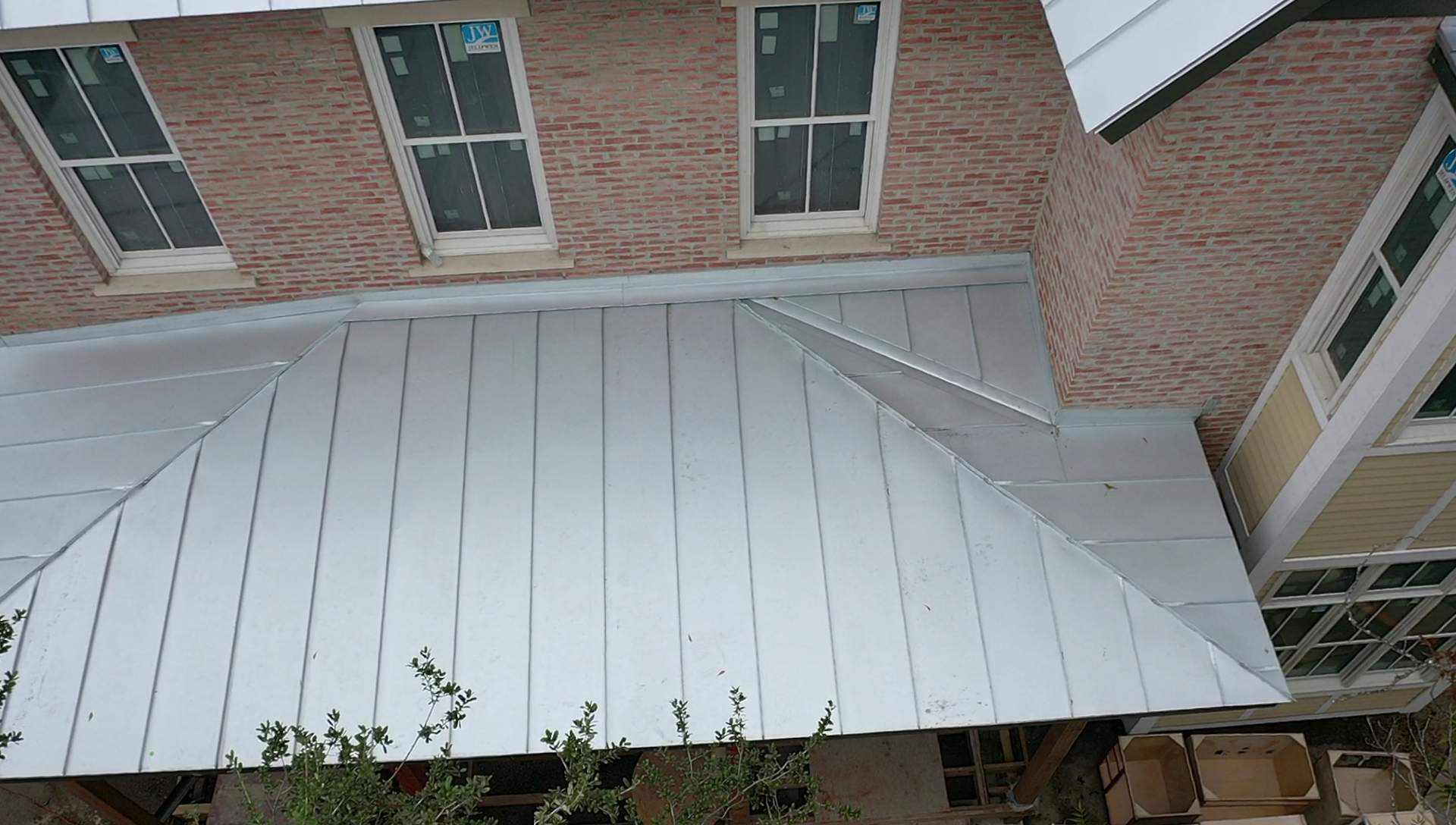 Residential Metal Roof Installation using McElroy Metal by Premier Roofing and Contracting