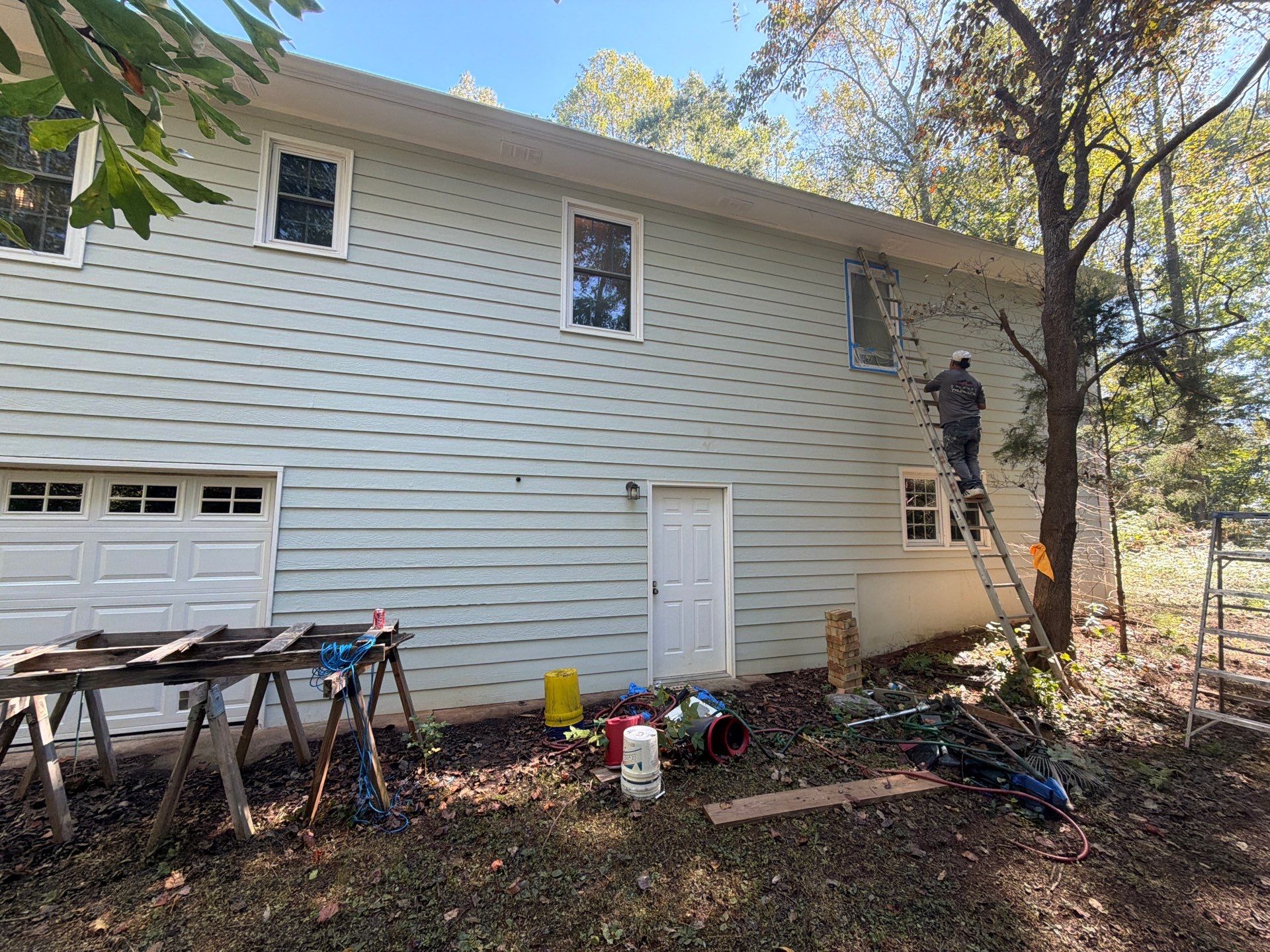 Exterior Residential Painting and Deck Refinishing in Canton, Georgia by Swift Home Renovations 