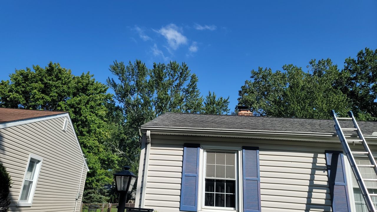 ATLAS PINNACLE COLOR: PRISTINE BLACK SHADOW DRIP EDGE: WHITE by Eagle Eye Roofing