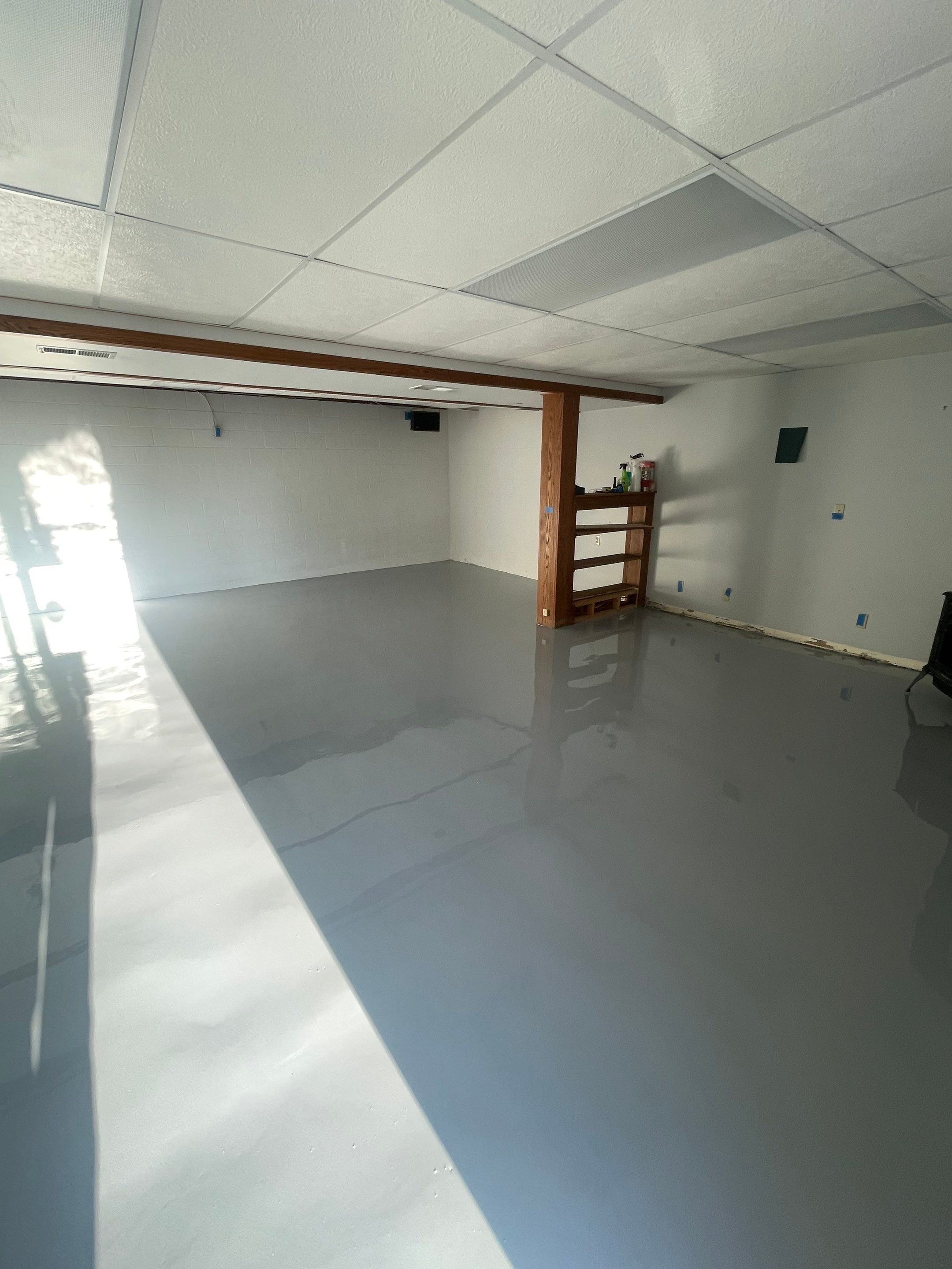 Solid Color Concrete Floor Coating for Renner Basement by Select Painting, Coatings & Garage Cabinets