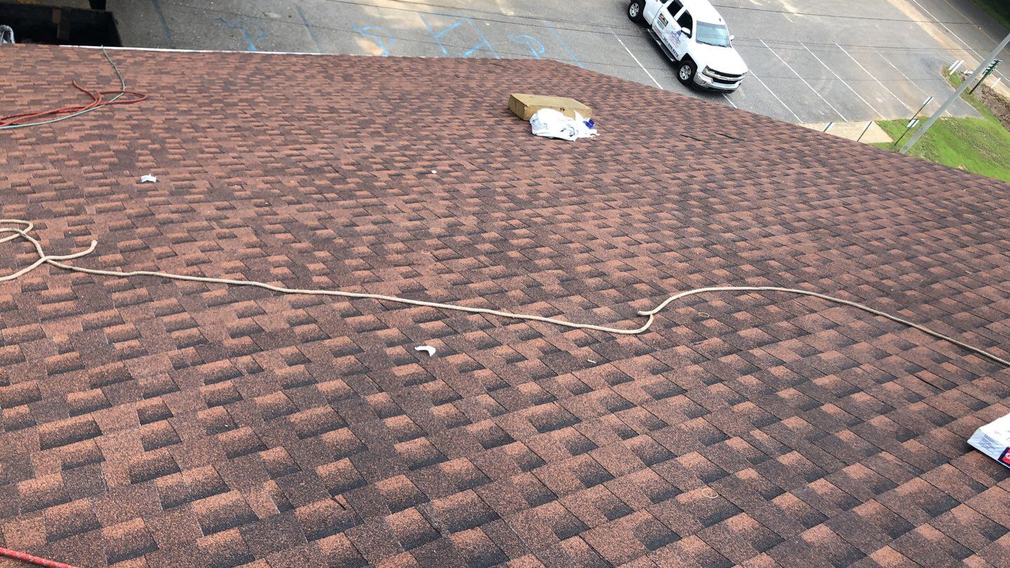 Residential Roofing Installation using Roof Replacement by American Roofing & Construction LLC