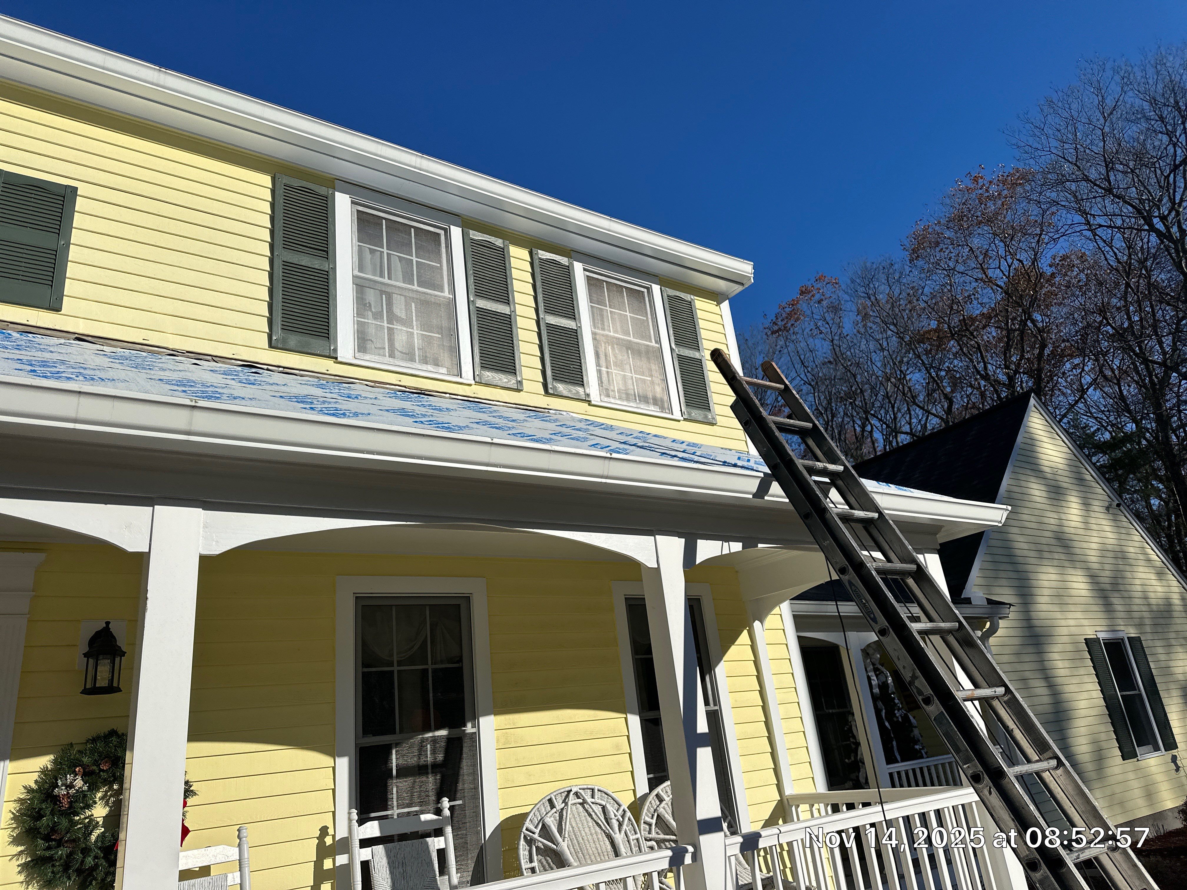 Chelmsford Premium Roof: Onyx Black Shingles with Standing Seam Metal Porch by Mighty Dog Roofing of Greater Middlesex County