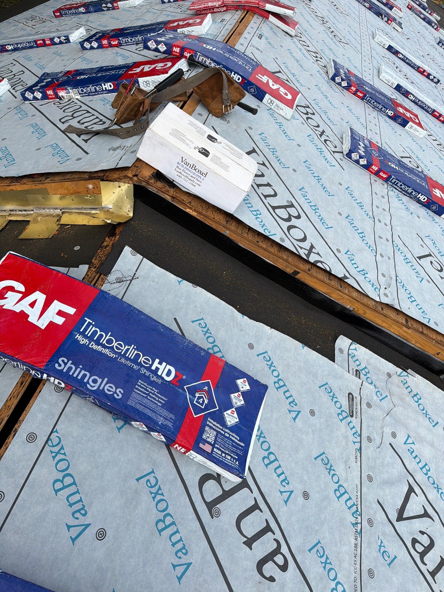 Residential Roofing Installation using GAF Timberline HDZ Charcoal by Rainstoppers Roofing