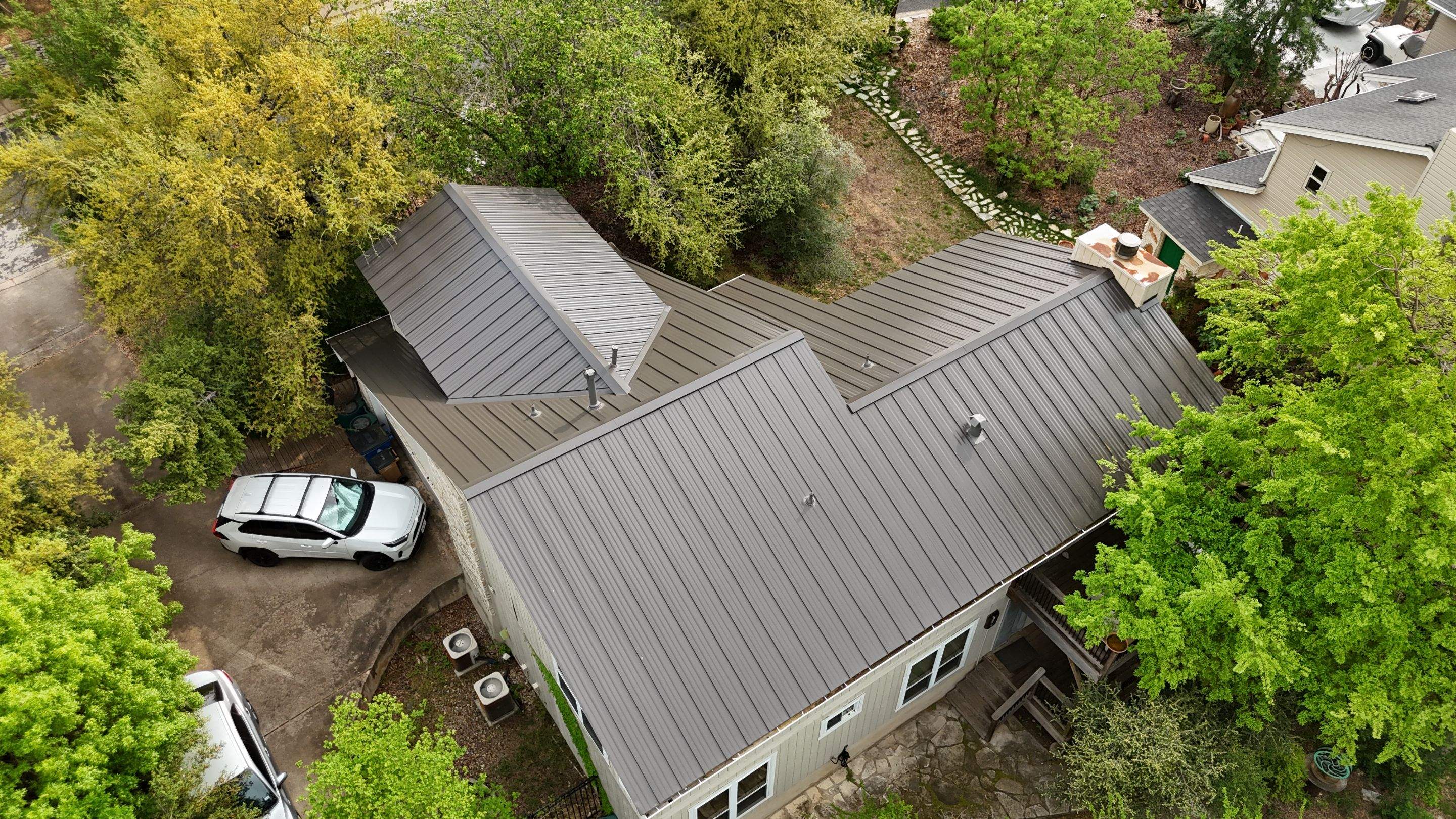 Dark Bronze - L&A Standing Seam with Striations by RoofsOnly.com