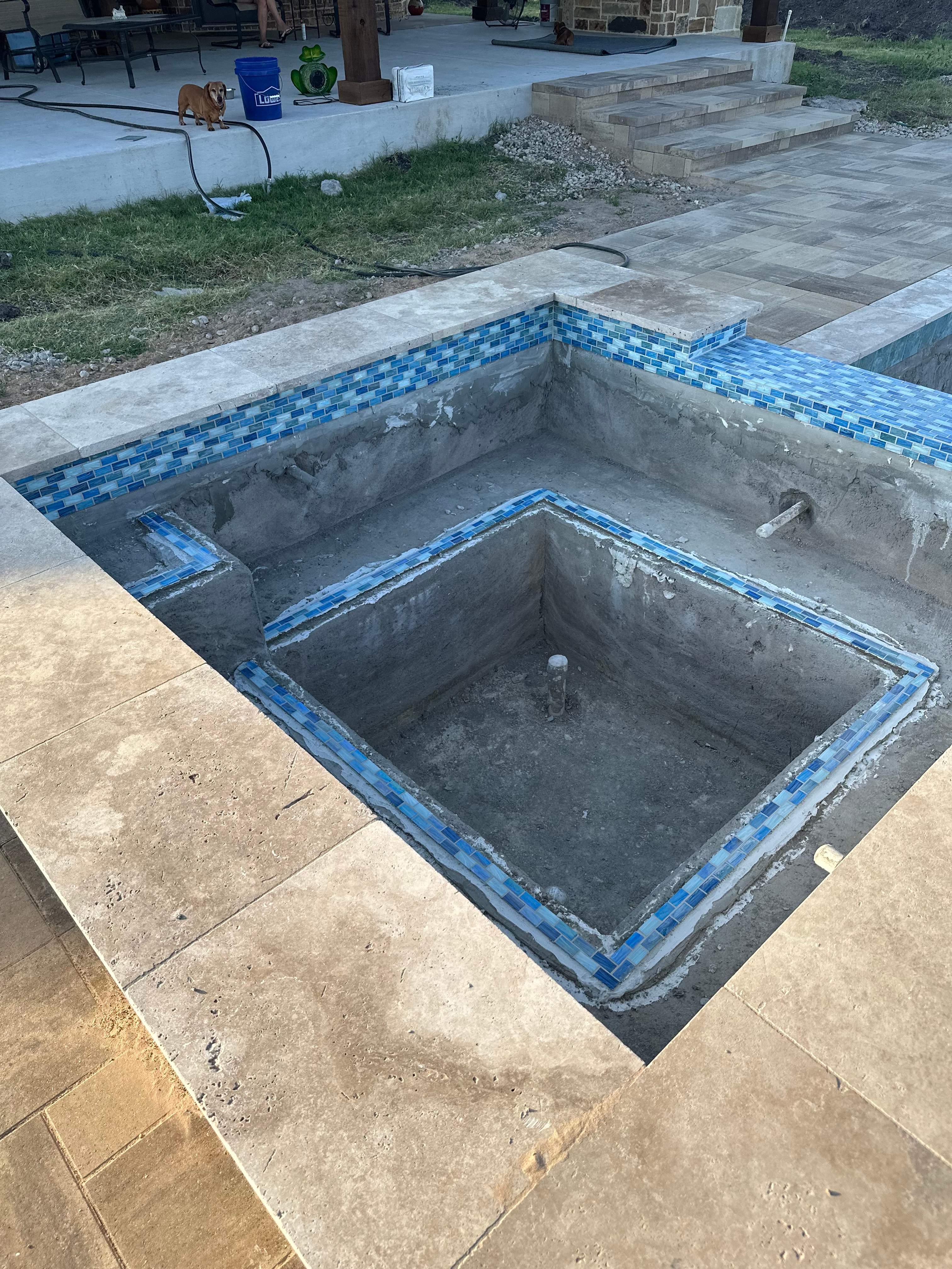 Freeform Pool and Spa with Travertine Decking and Bubblers by Pinnacle Pools and Spas - DFW
