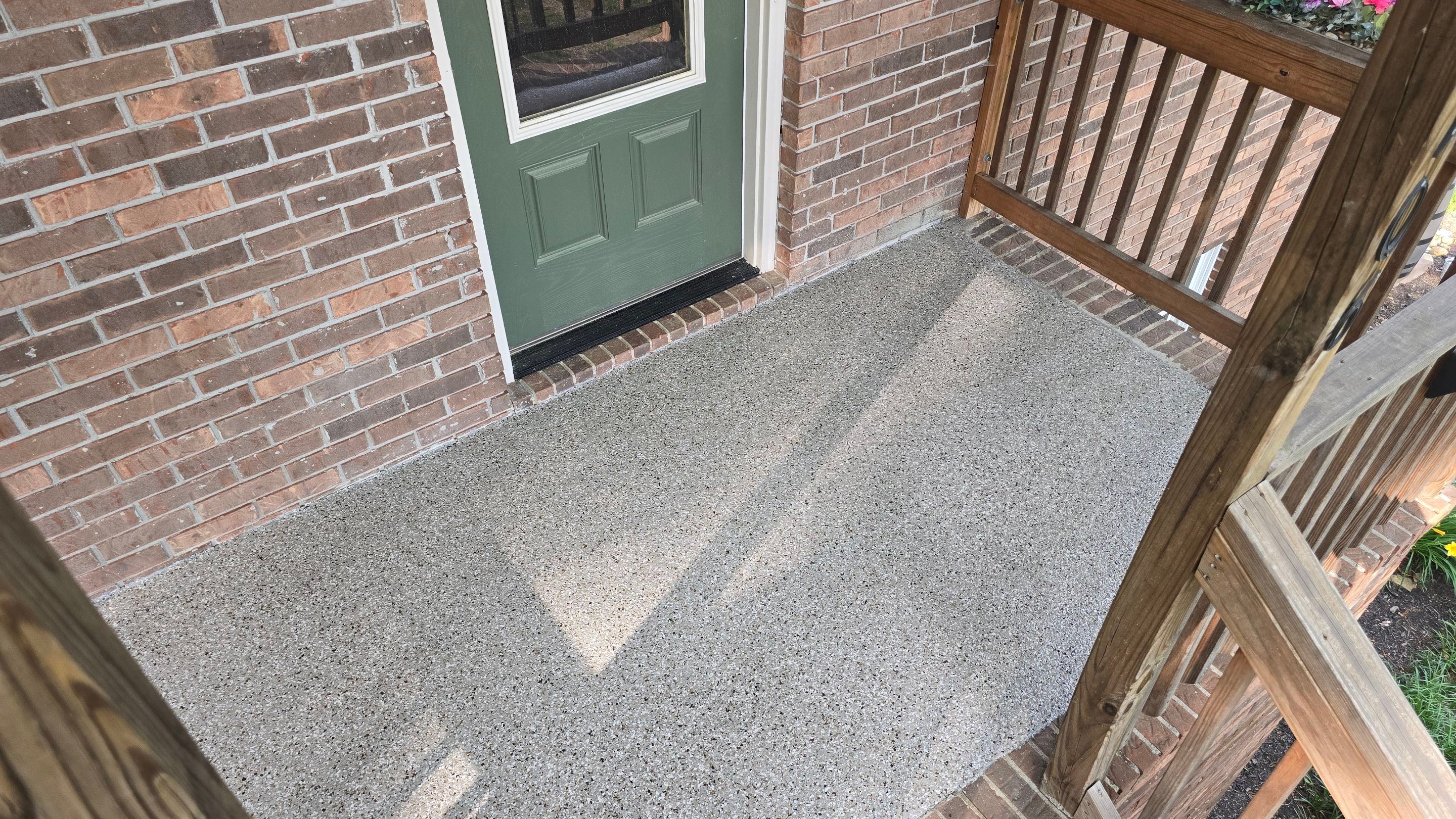 Garage & Porch Using Creekbed by Elite Floor Solutions