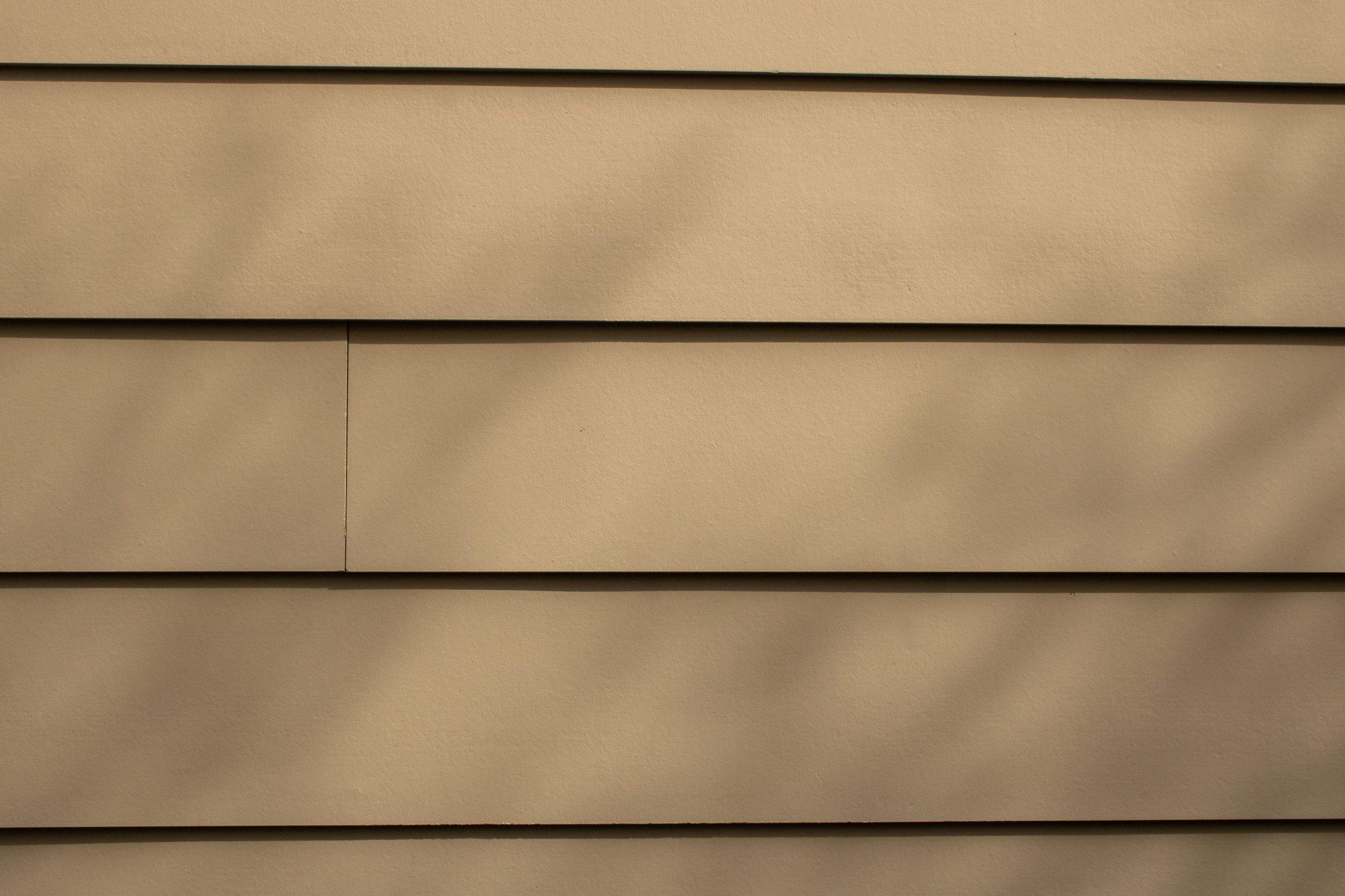 Full Siding Replacement, Deck Build, Exterior Paint, and Gutter Replacement  by Nelson Exteriors 