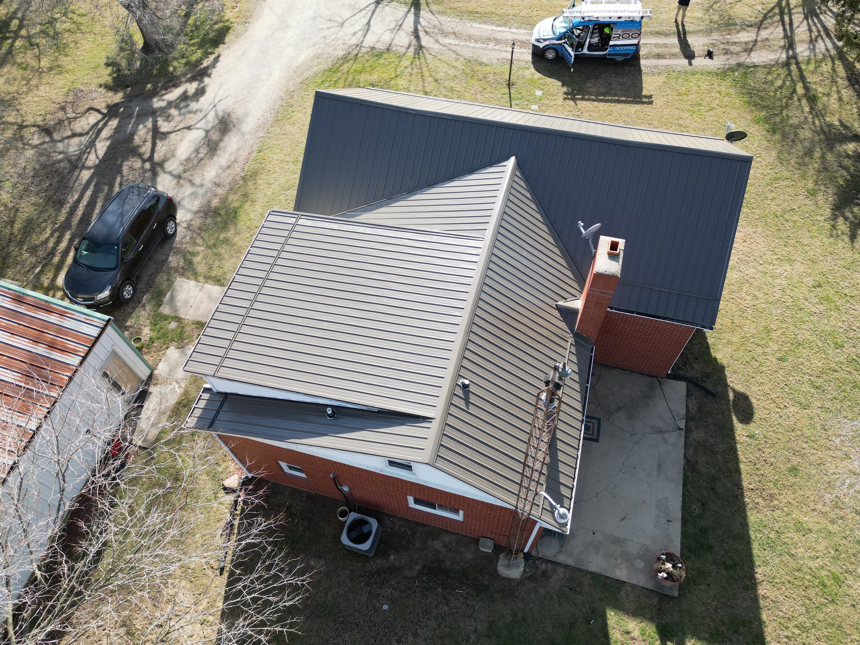 Residential Roofing Installation using Performance Panel Metal - Burnished Slate by RoofX 