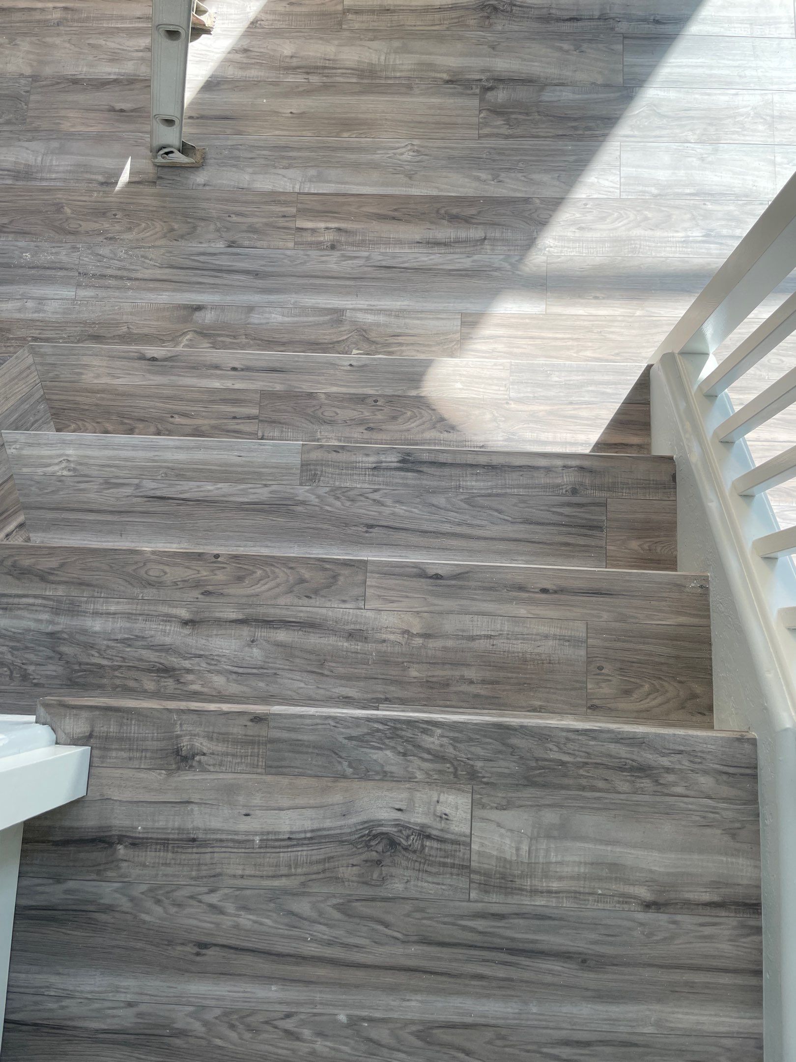 Laminate Staircase and Flooring  by Footprints Floors of Chandler 