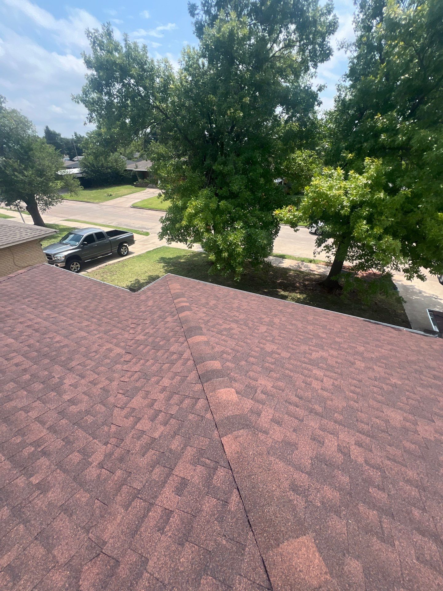 Roof Replacement and Gutter Installation in Oklahoma City, OK by McCann's Roofing and Construction