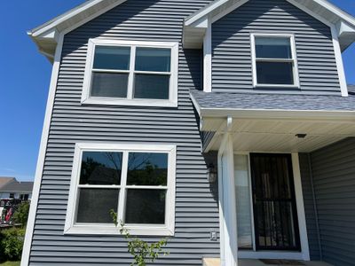 Window and siding replacment using Pella 250 series vinyl window