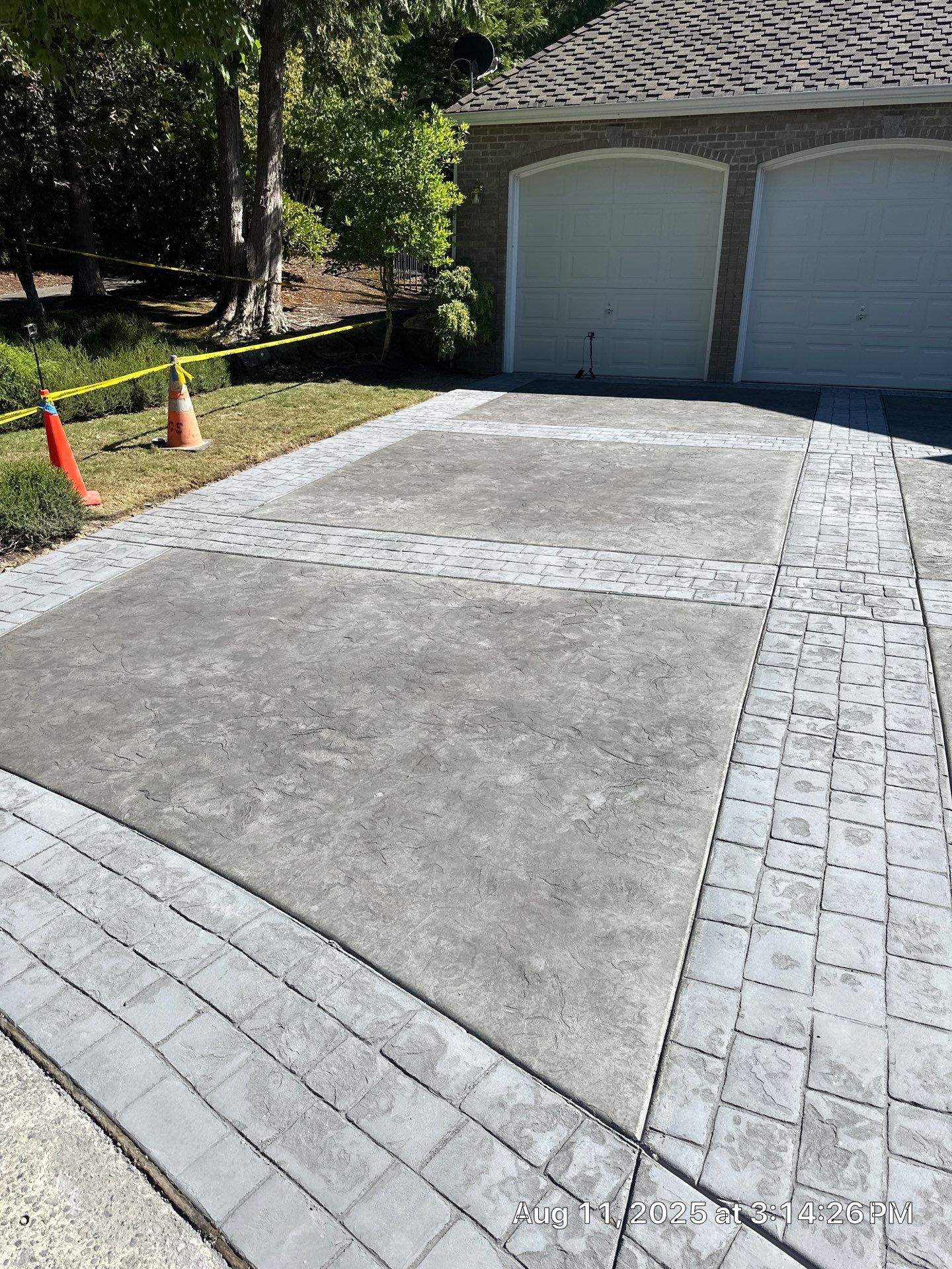 Multi-color Stamped & Sealed Concrete Driveway Renovation | Mukilteo by Jireh Asphalt & Concrete Inc