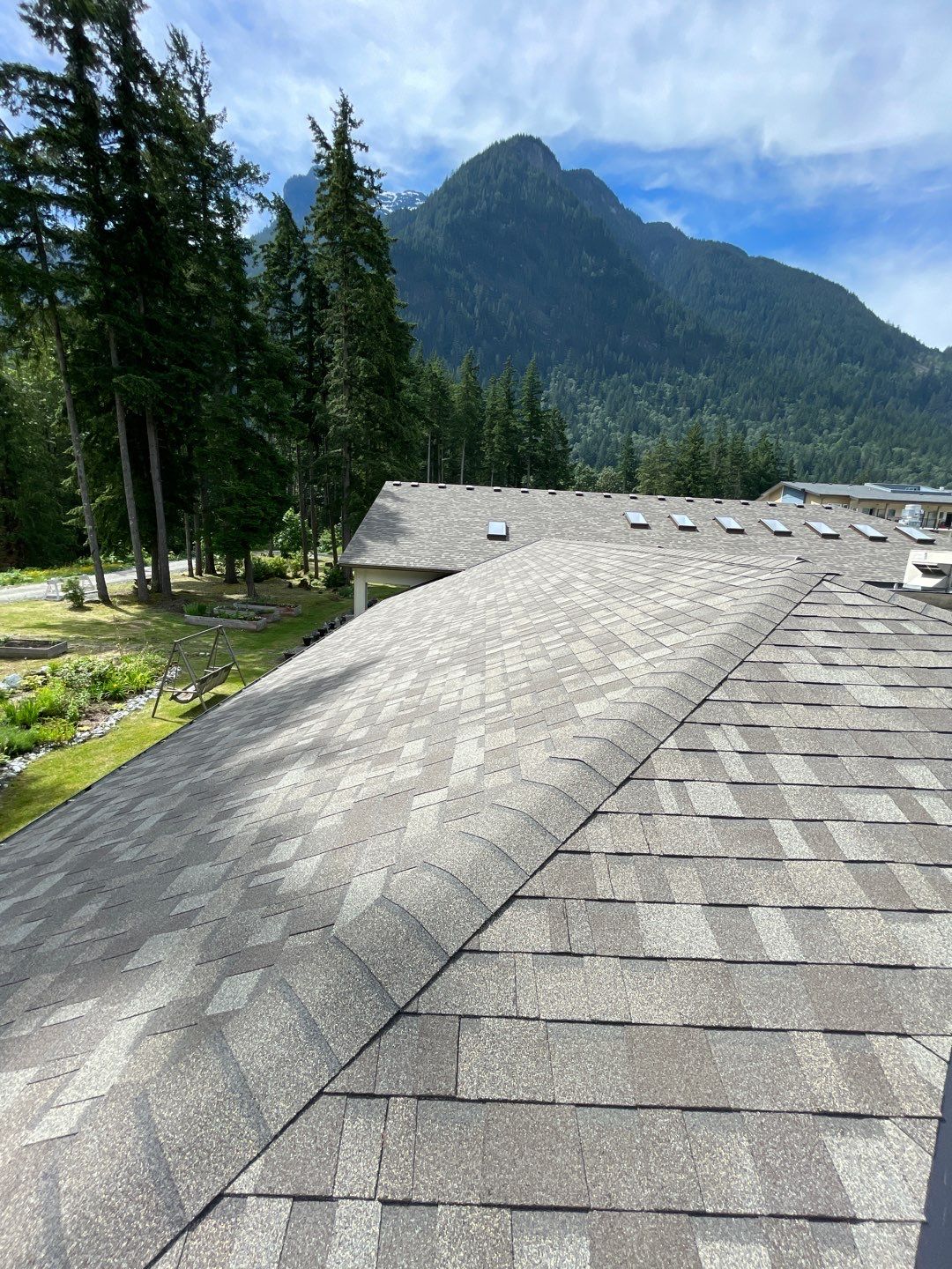 Residential ReRoofing Installation using OC Oakridge shingles by Top Notch Roofing Inc