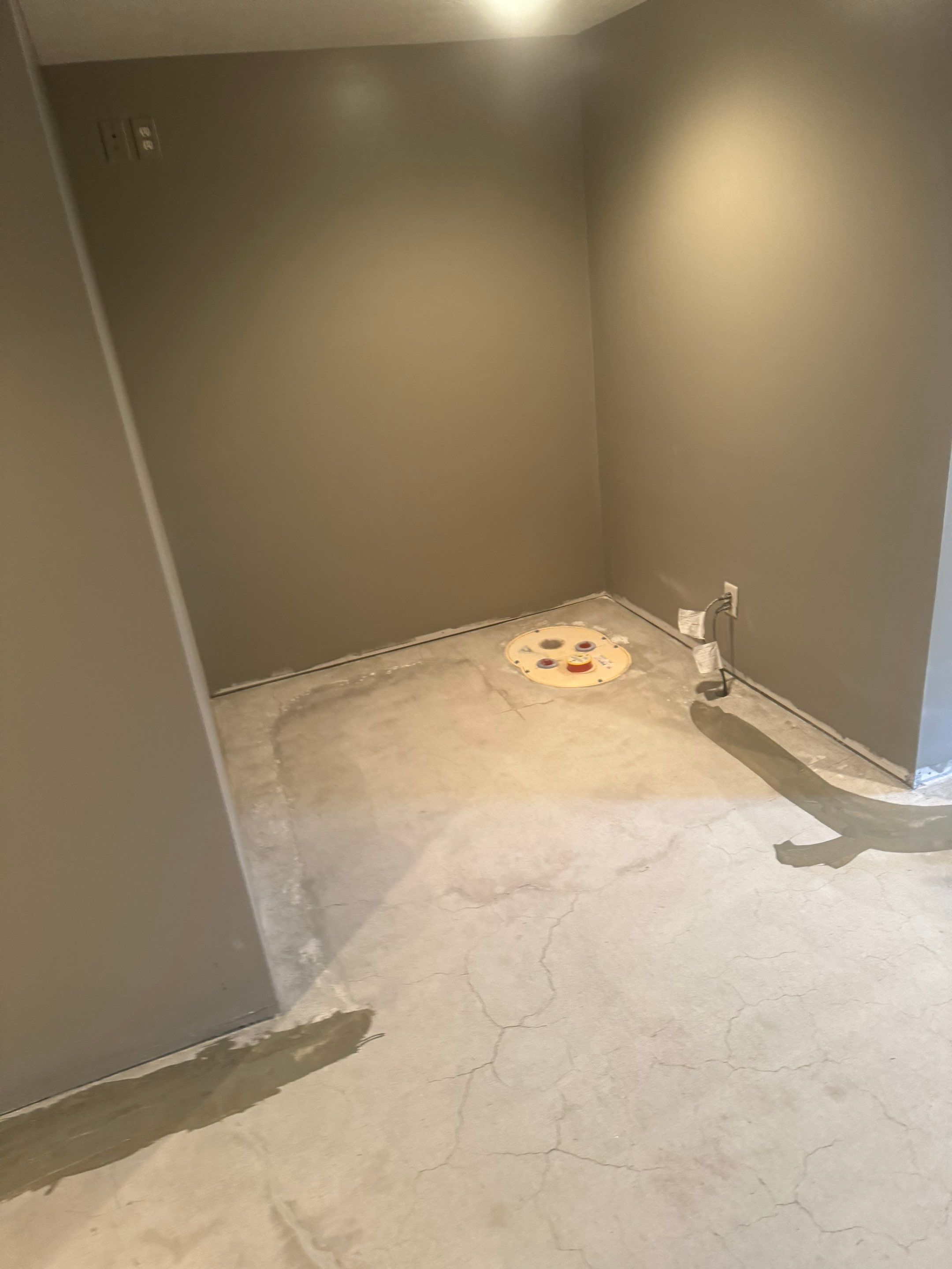 Custom Multi-Fleck Epoxy Floor Coating for Residential Basement by Select Painting, Coatings & Garage Cabinets